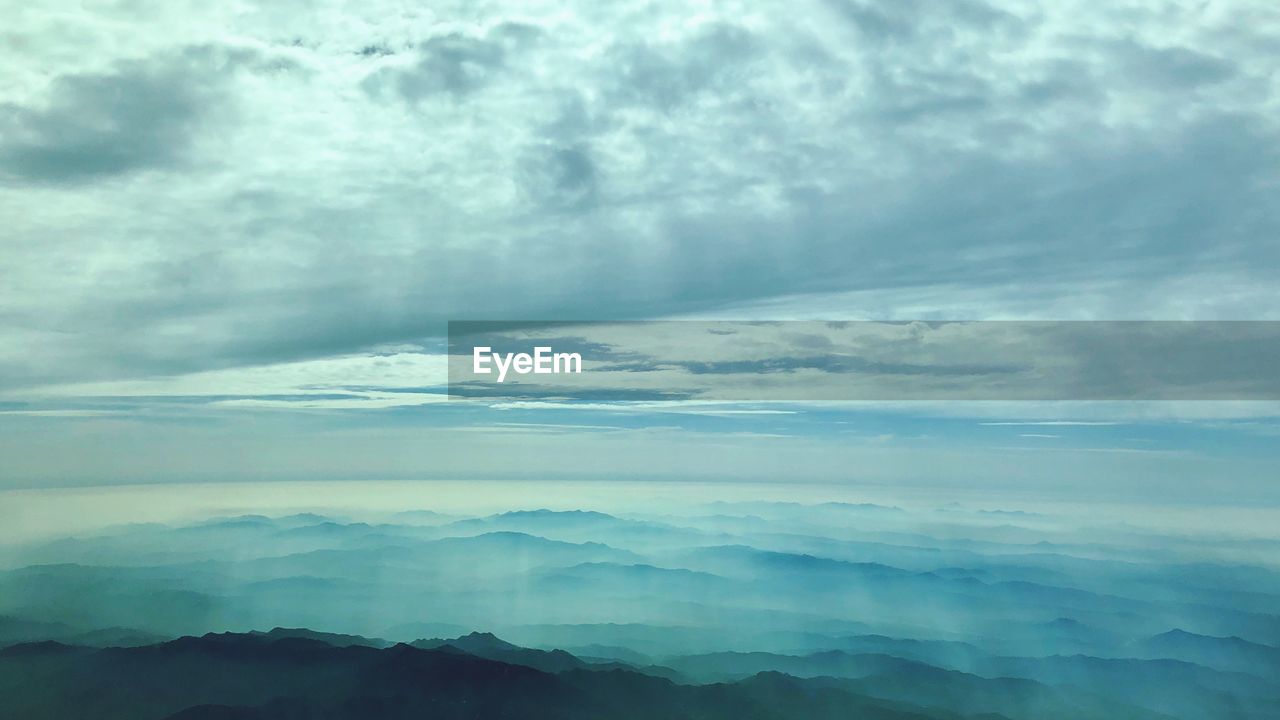 Low angle view of cloudscape against sky during sunset