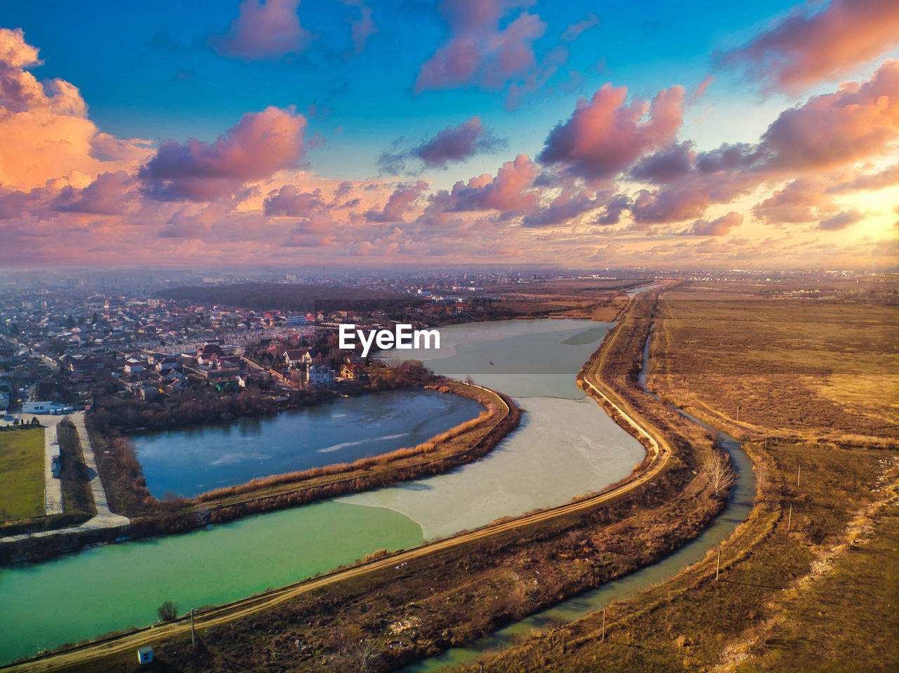 High angle view of cityscape against sky during sunset