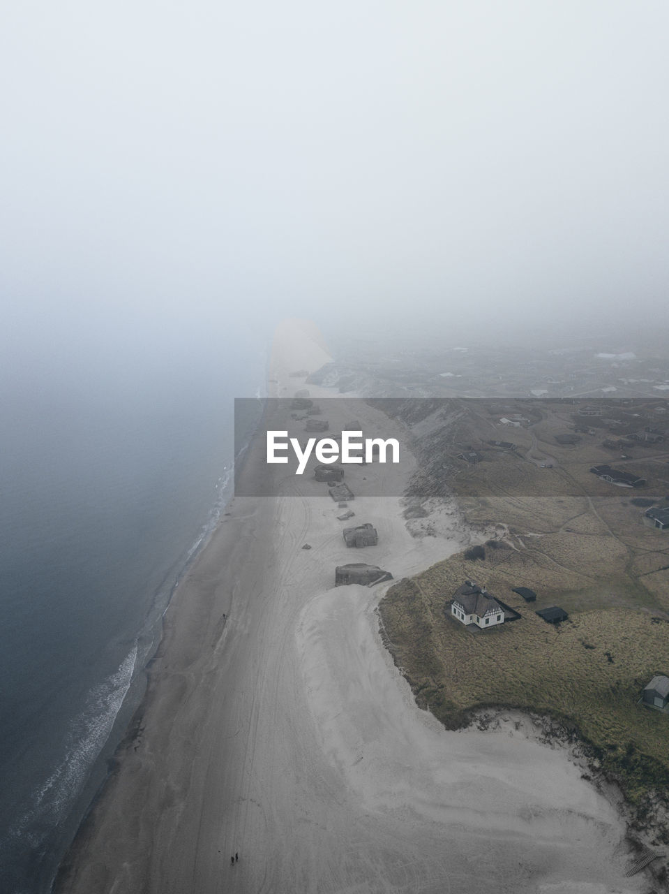 Aerial view of landscape against sky during winter