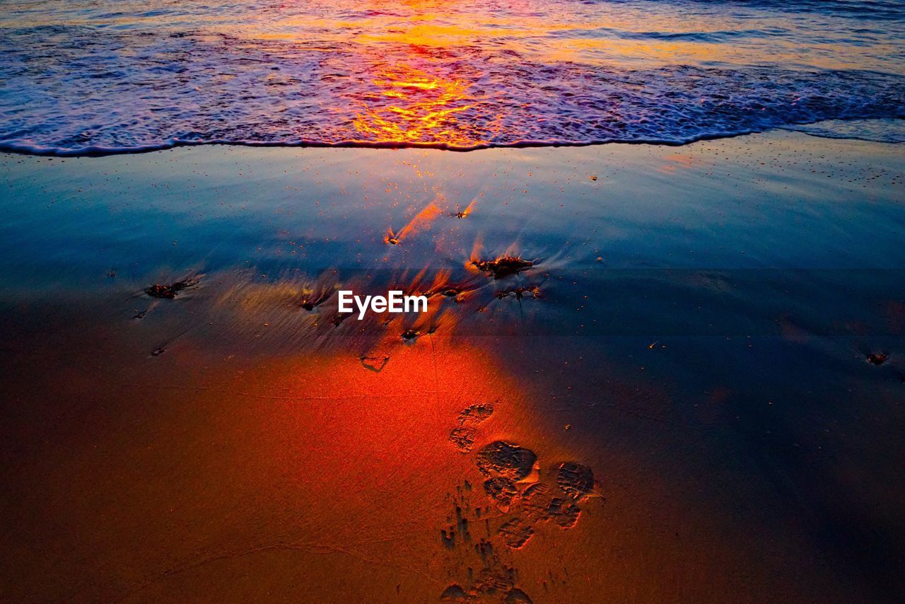 High angle view of lake at sunset