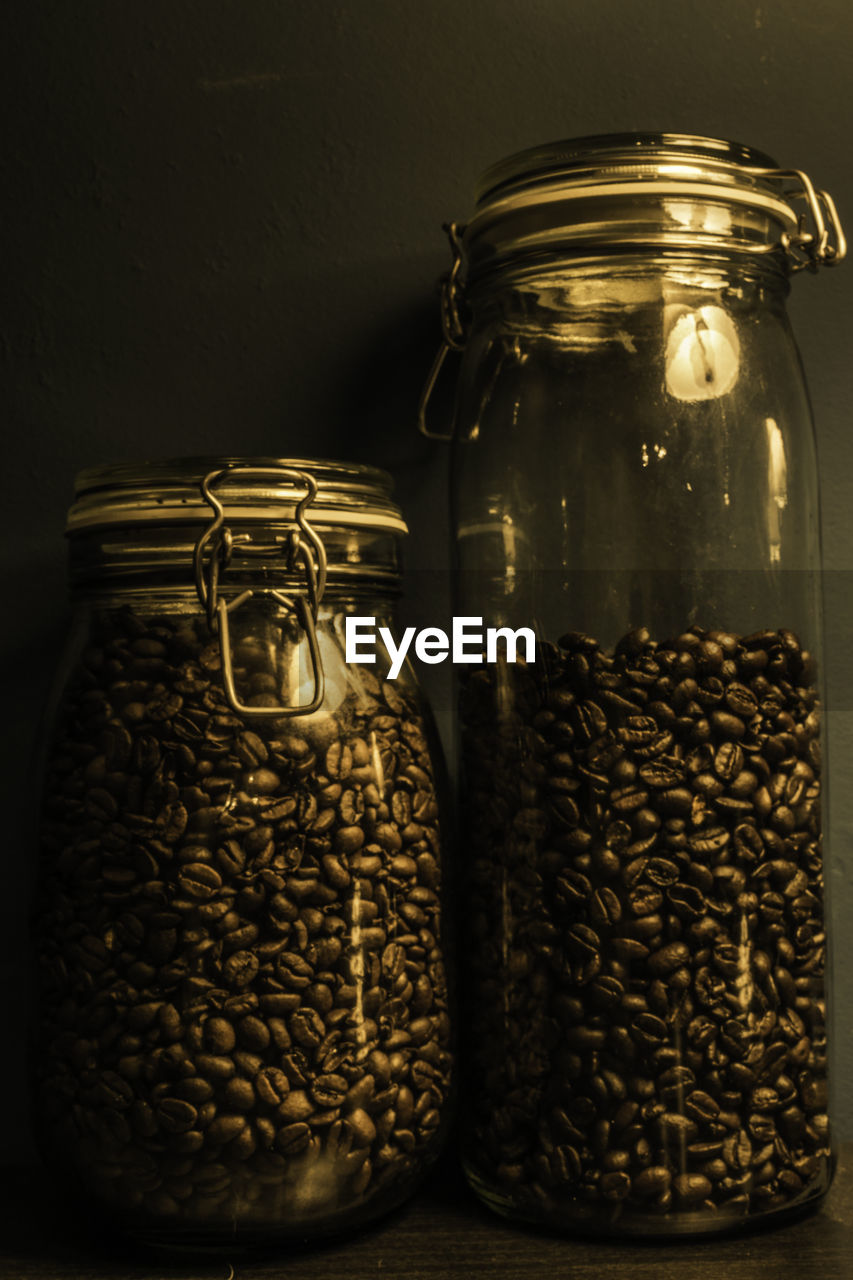 Close-up of coffee beans in jar 