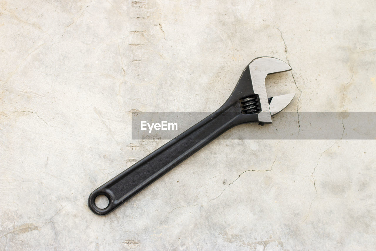 High angle view of wrench on floor