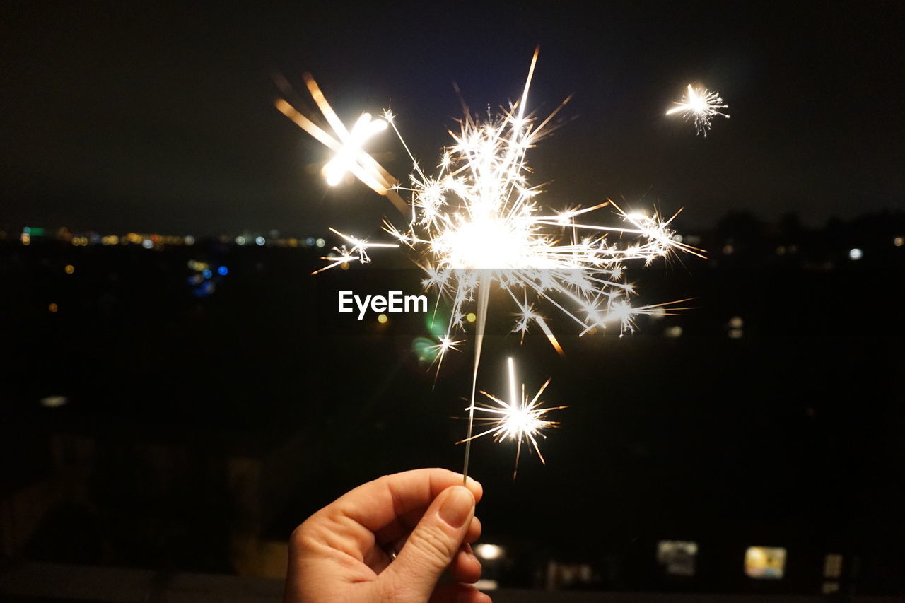 Personal perspective of person holding sparkler