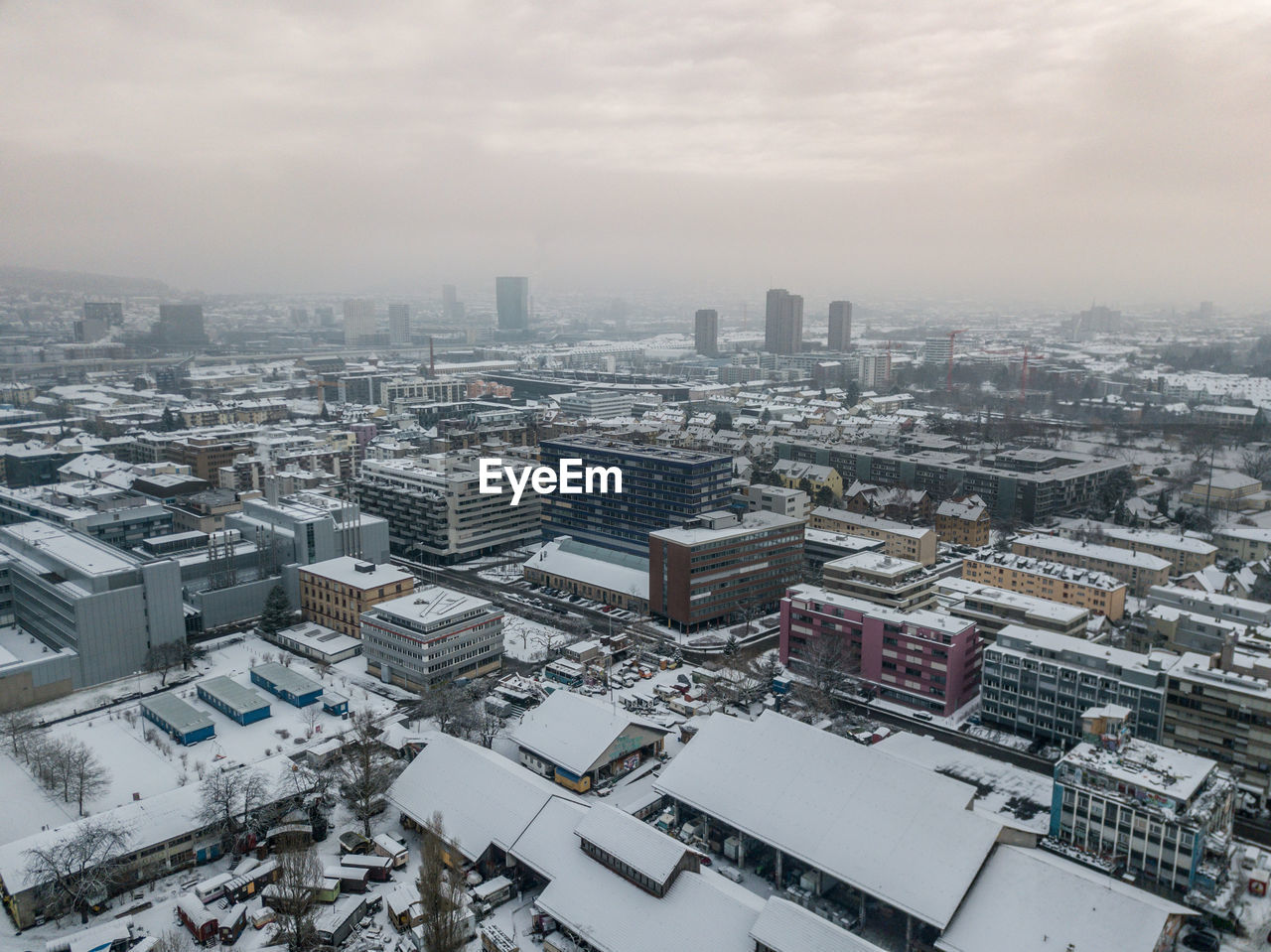 High angle view of city against sky during winter