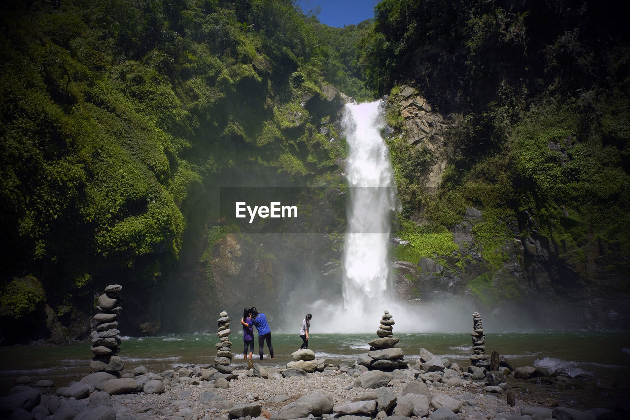 SCENIC VIEW OF WATERFALL