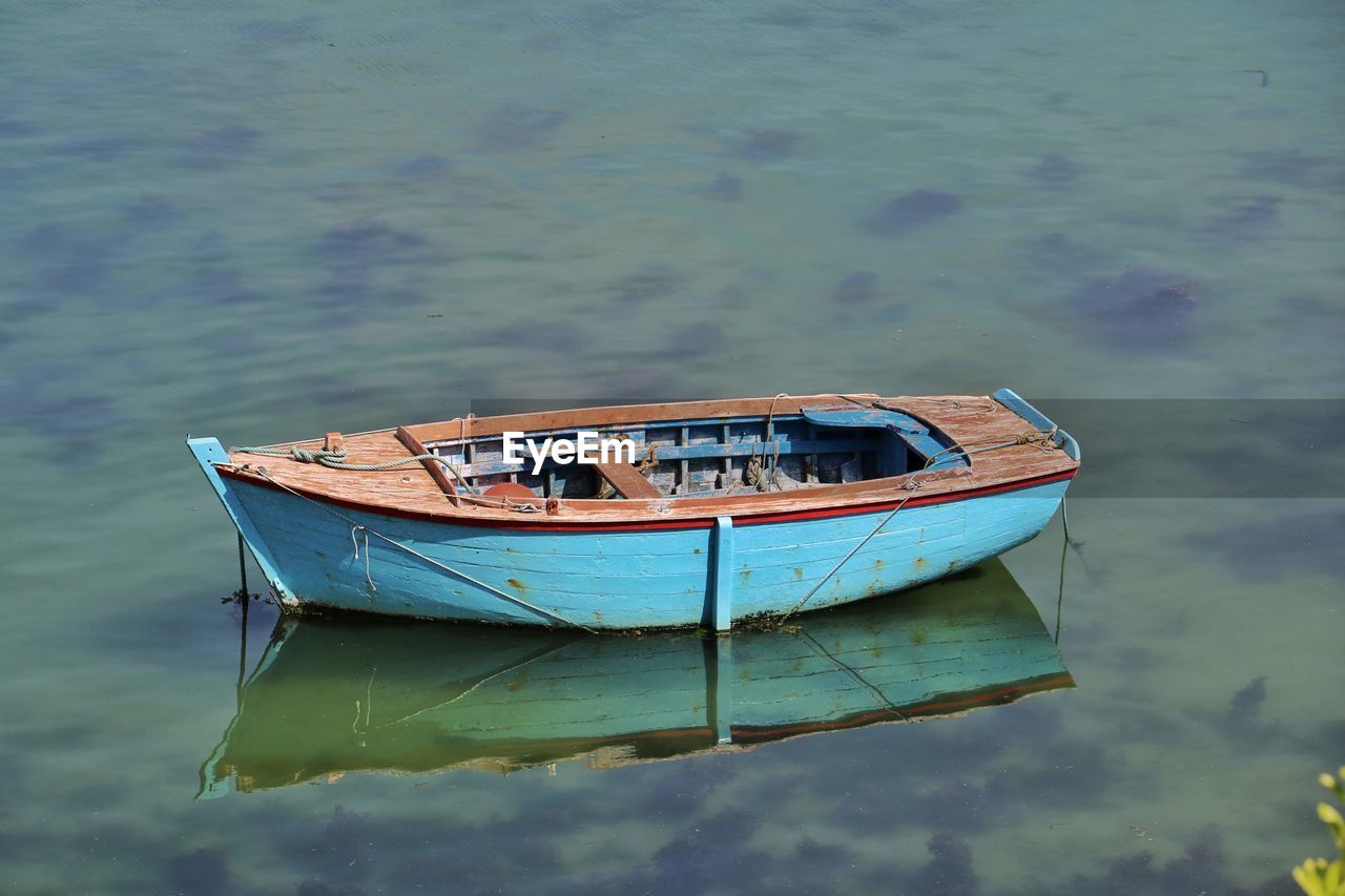 High angle view of boat moored on sea