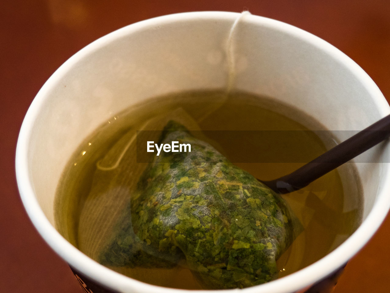 CLOSE-UP OF TEA IN BOWL ON KITCHEN