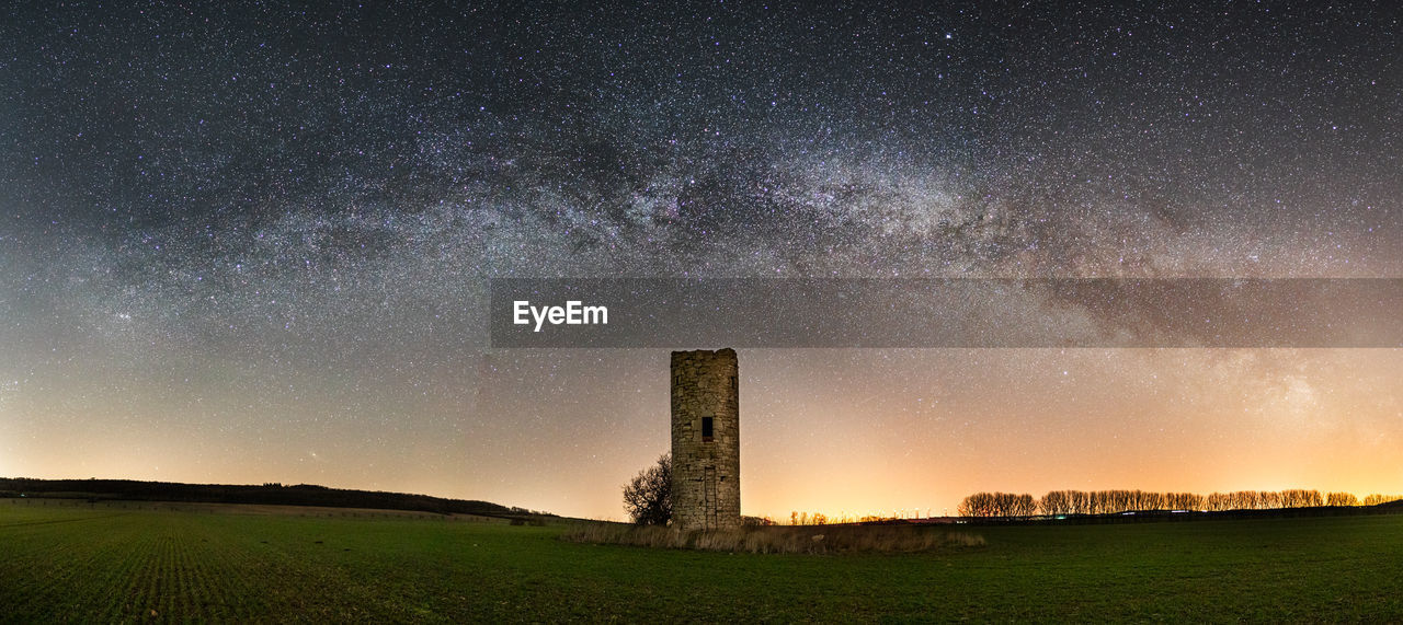 Scenic view of star field against sky at night