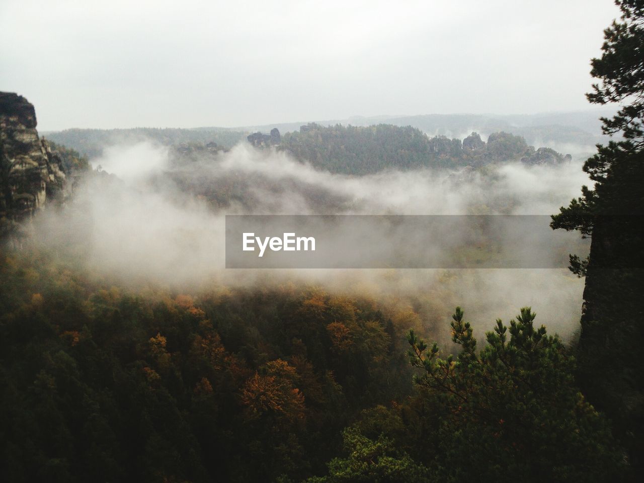 Scenic view of fog against sky