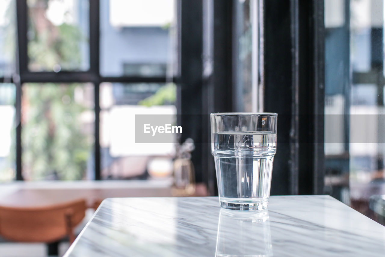 Close-up of water in glass on table