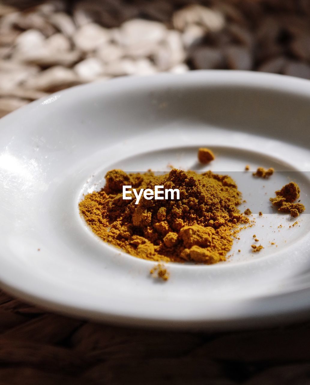 Close-up of spice in plate on table