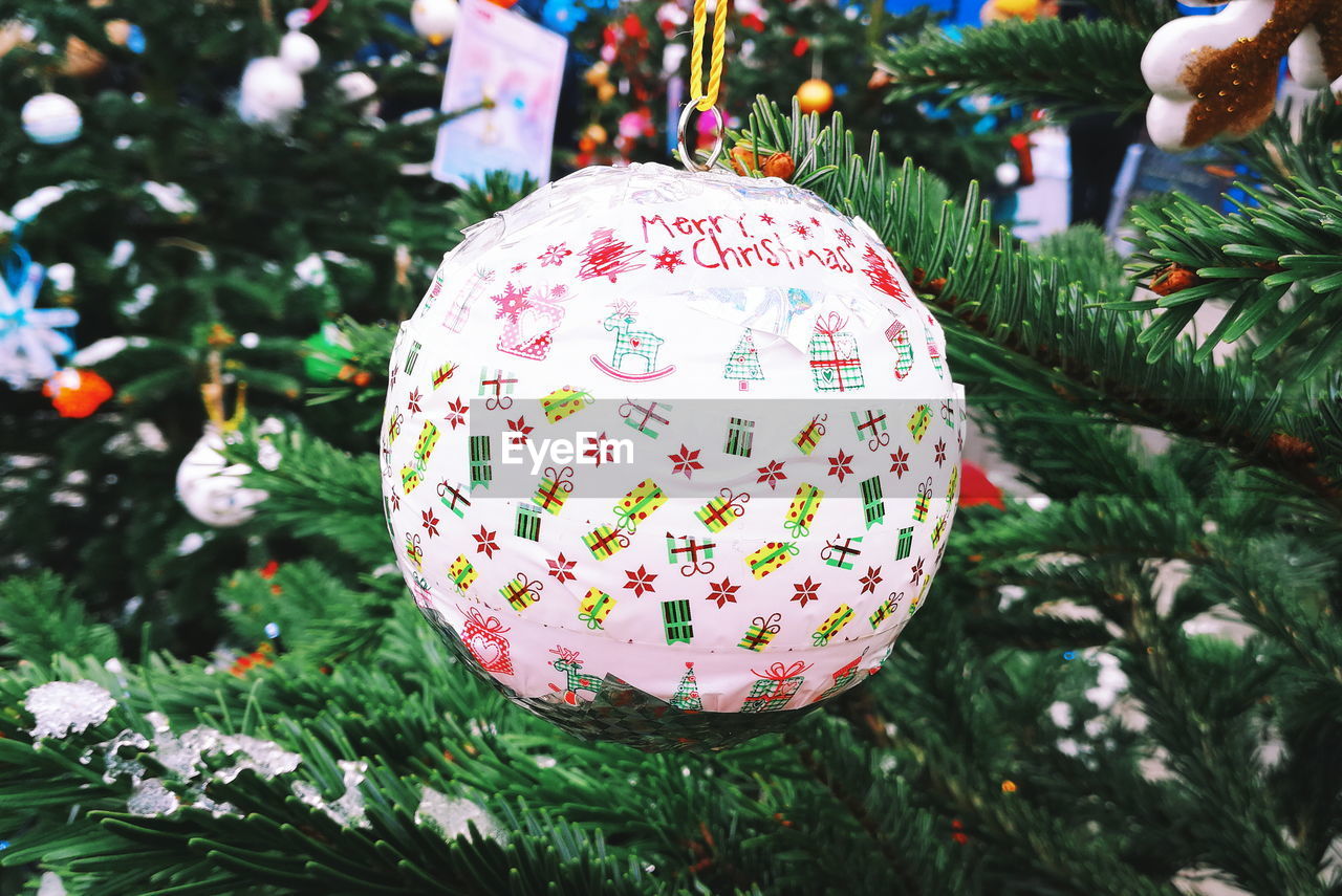 Close-up of christmas decoration hanging on tree