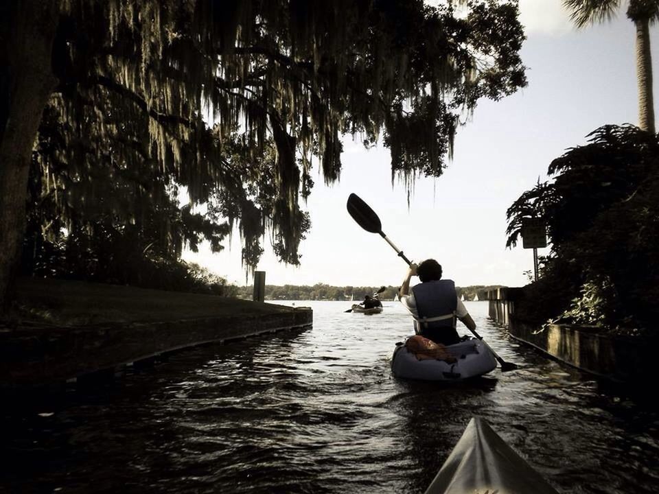 Tourist kayaking in canal