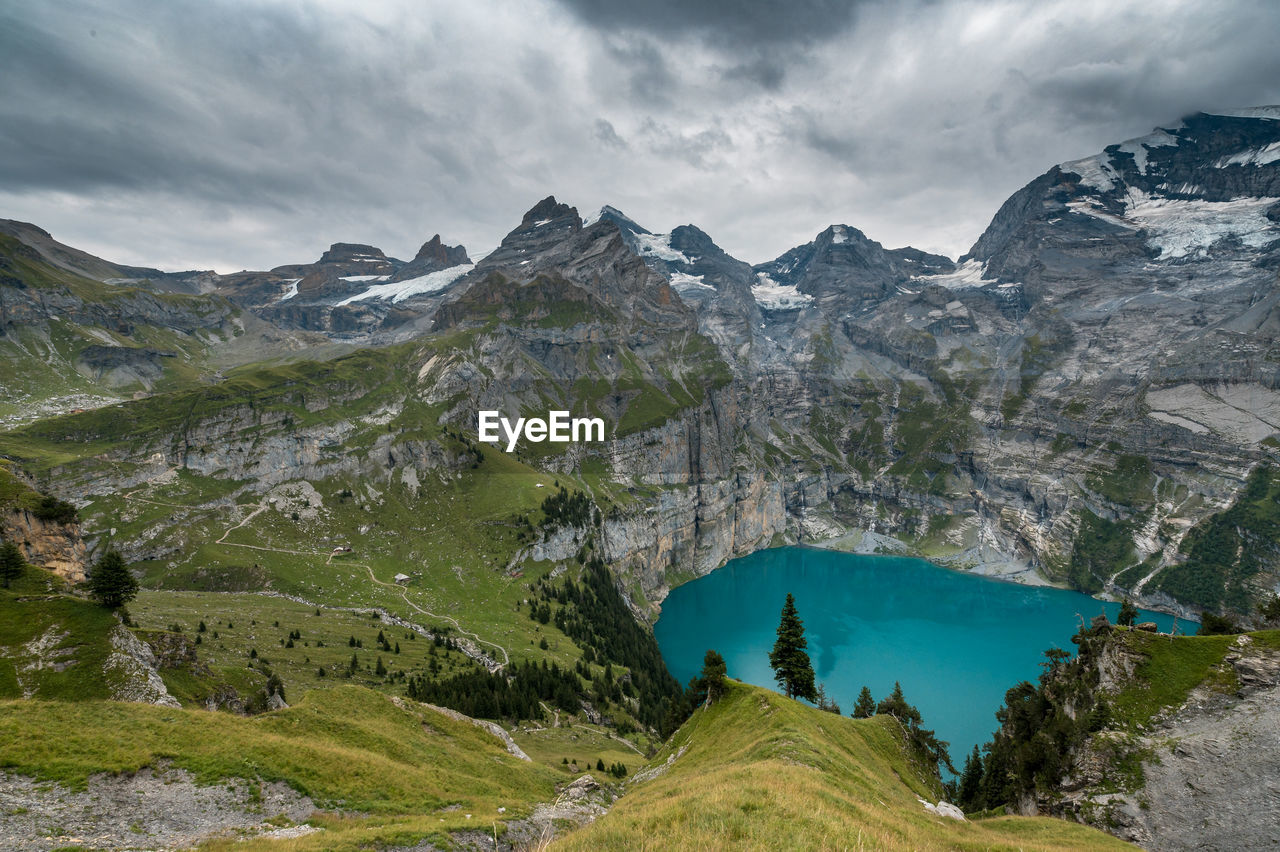 PANORAMIC VIEW OF LAKE AND MOUNTAIN AGAINST SKY