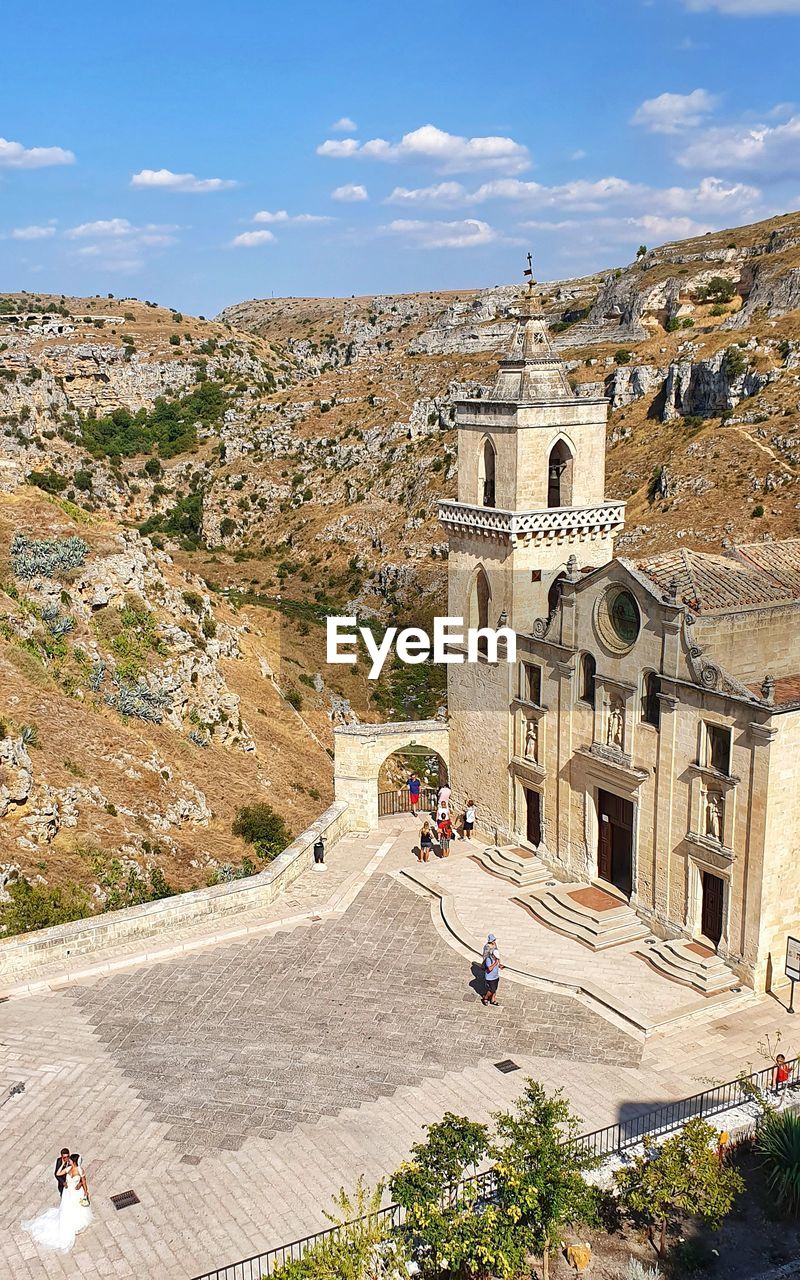 HIGH ANGLE VIEW OF PEOPLE ON MOUNTAIN