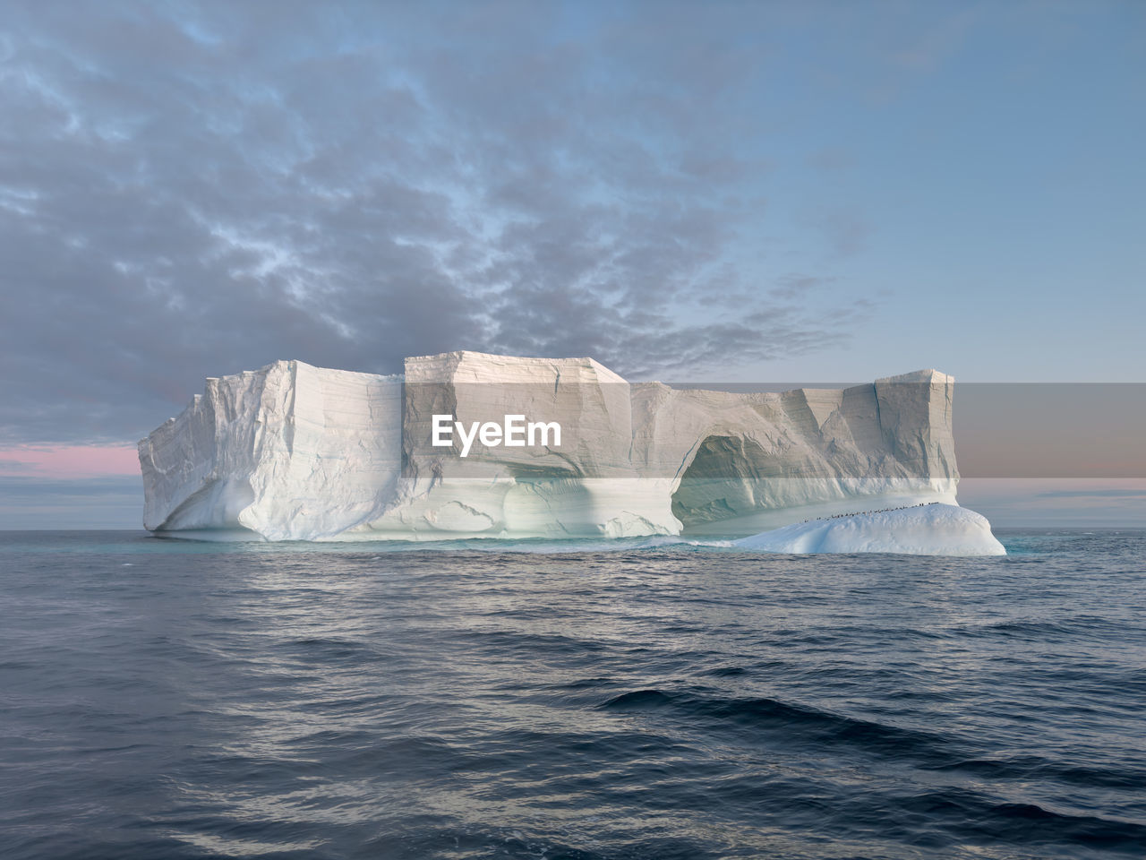 rock formations in sea against sky