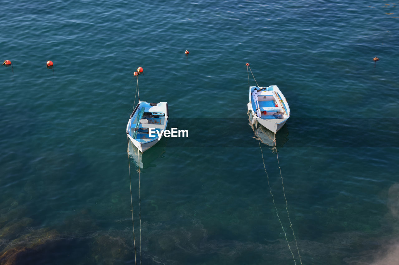 High angle view of boats moored in sea