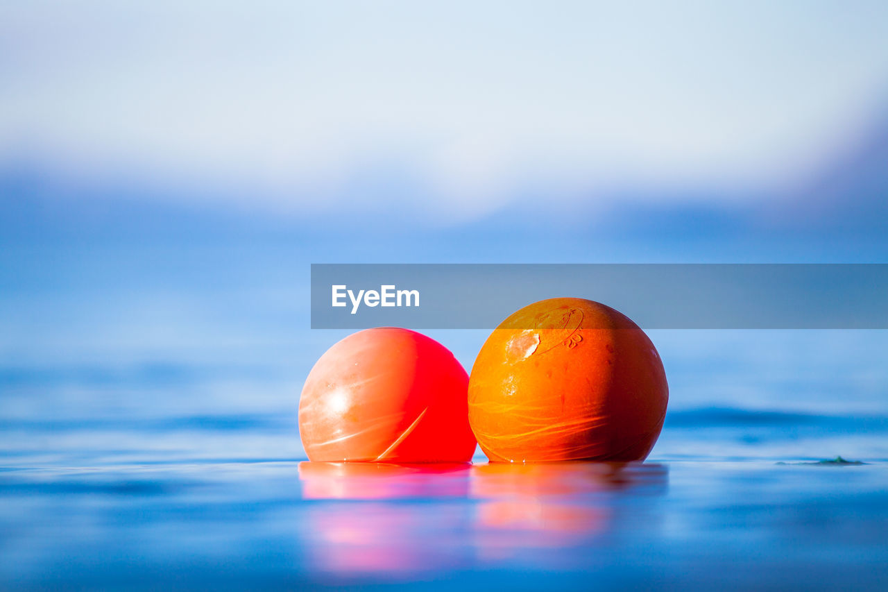 Surface level of buoys floating on water