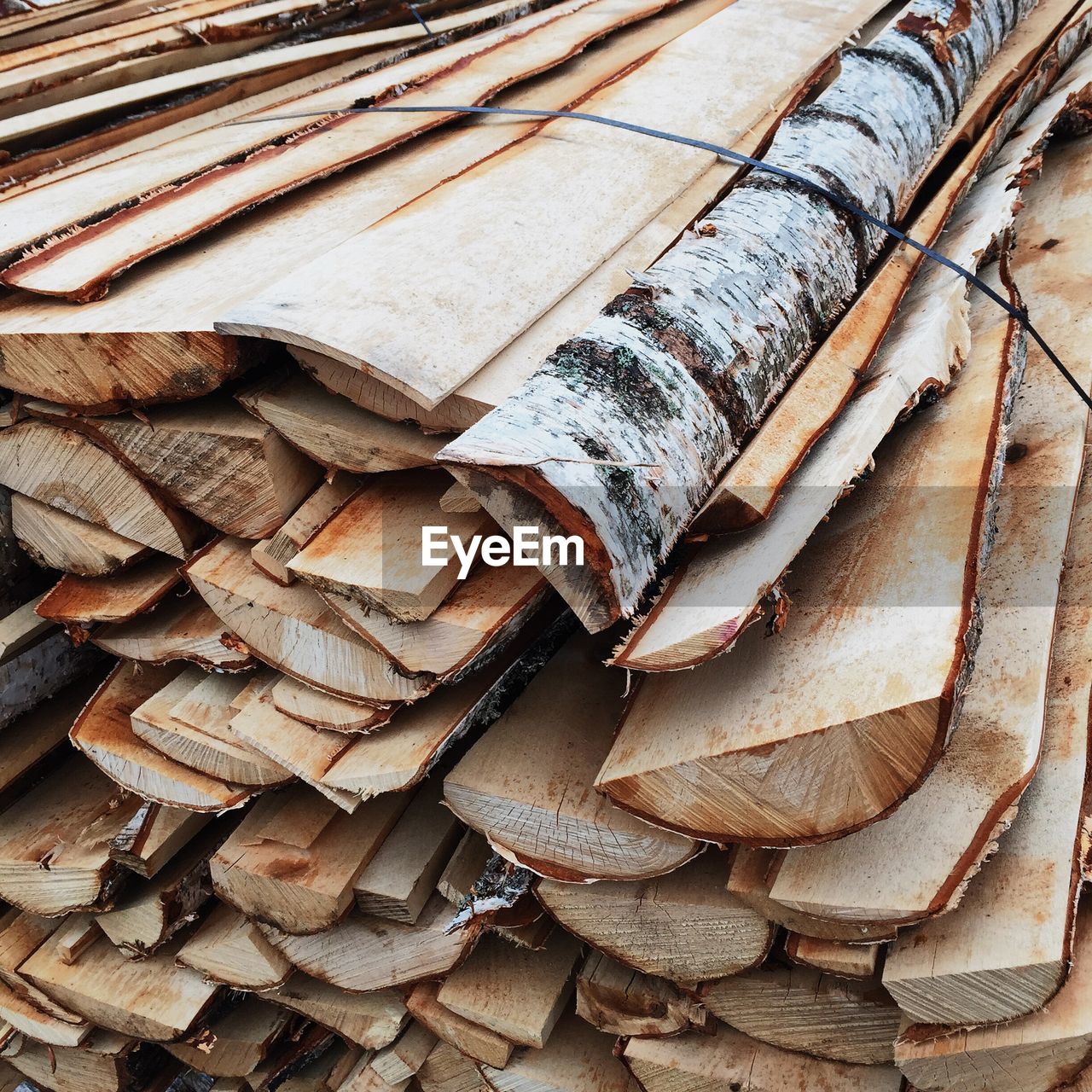 High angle view of firewood stack