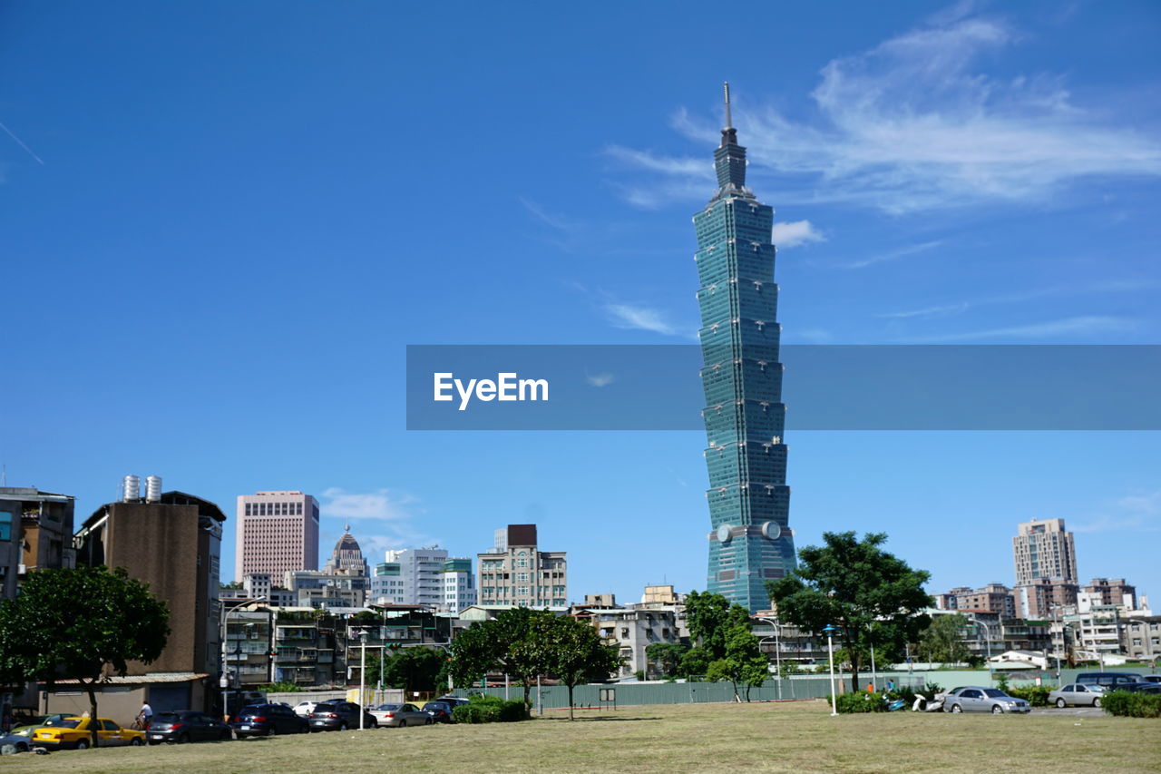 City skyline against blue sky