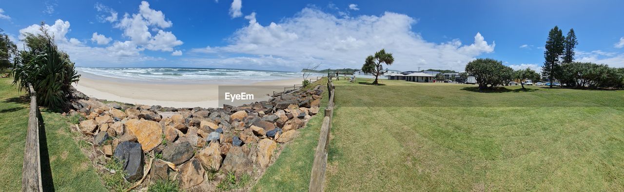land, sky, panoramic, plant, nature, water, sea, landscape, cloud, beach, scenics - nature, environment, tree, grass, beauty in nature, travel destinations, no people, travel, tranquility, day, coast, tranquil scene, terrain, outdoors, coastline, tourism, field, blue, vacation, rural scene, non-urban scene, green, horizon, rural area, fence