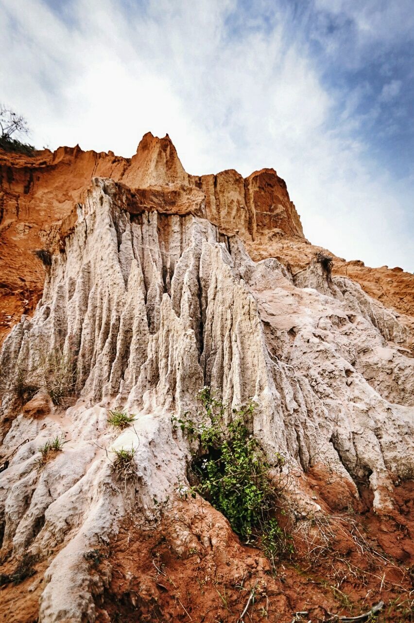 Low angle view of rocky landscape against the sky