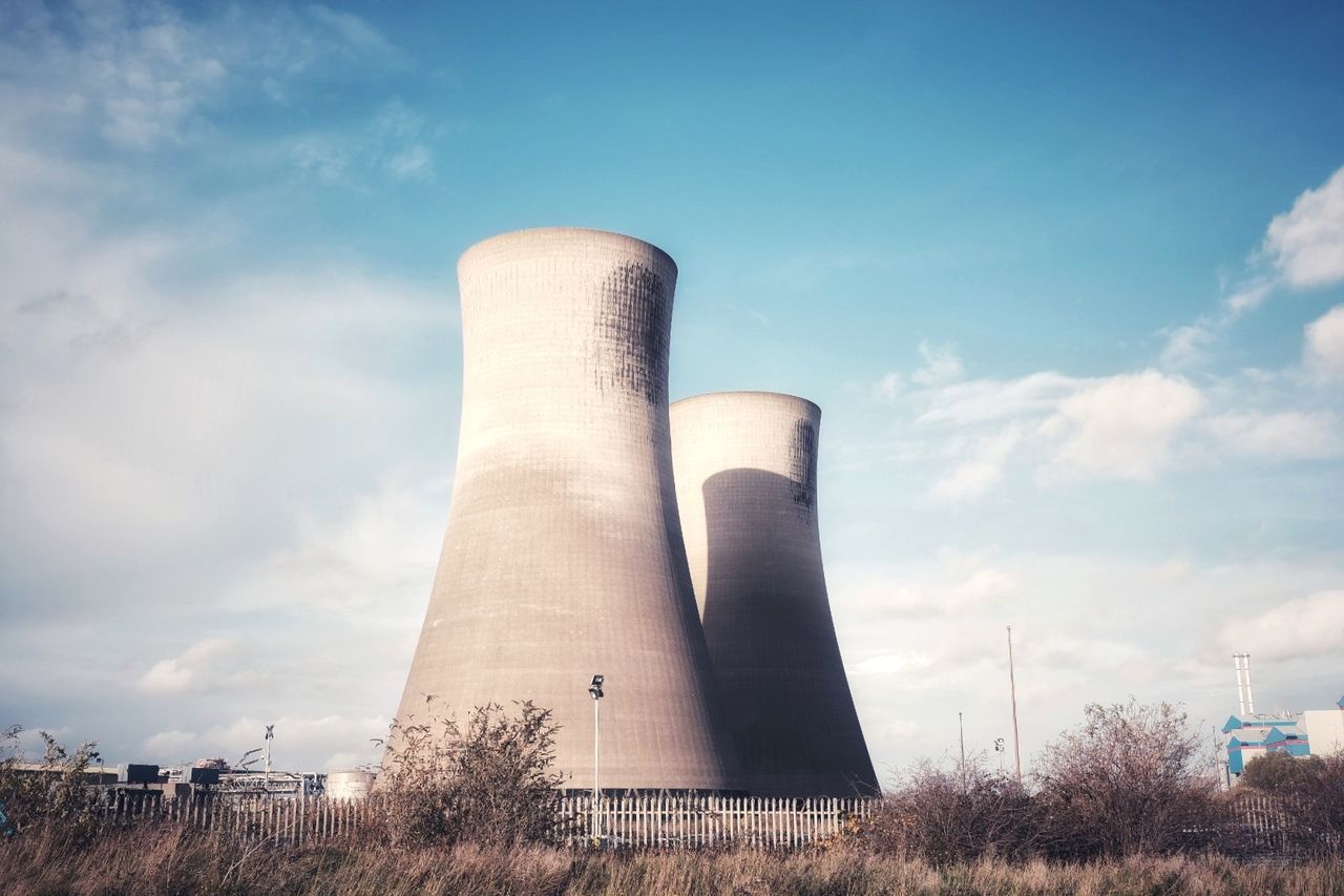 LOW ANGLE VIEW OF INDUSTRY AGAINST SKY