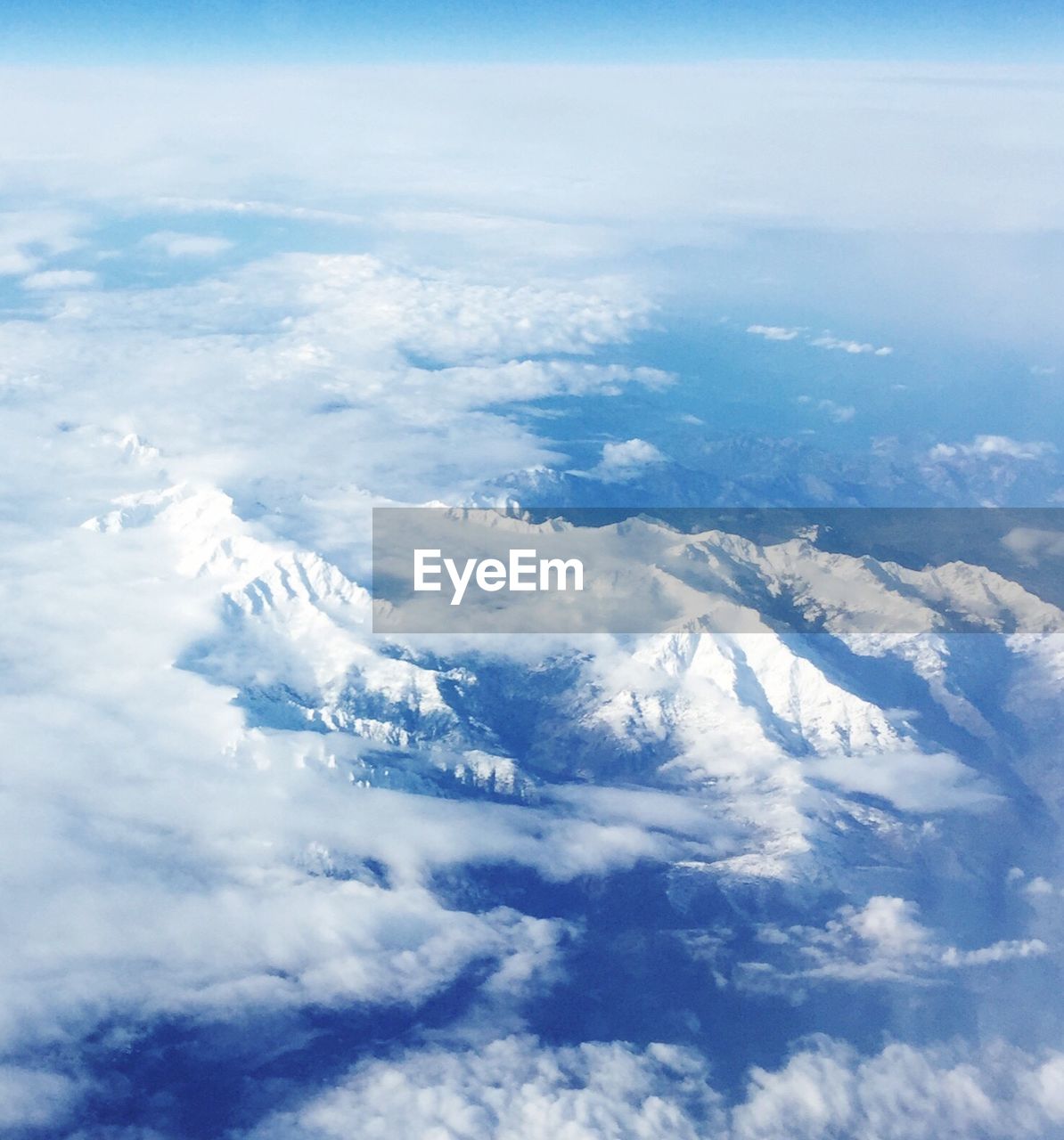 AERIAL VIEW OF CLOUDS OVER SKY