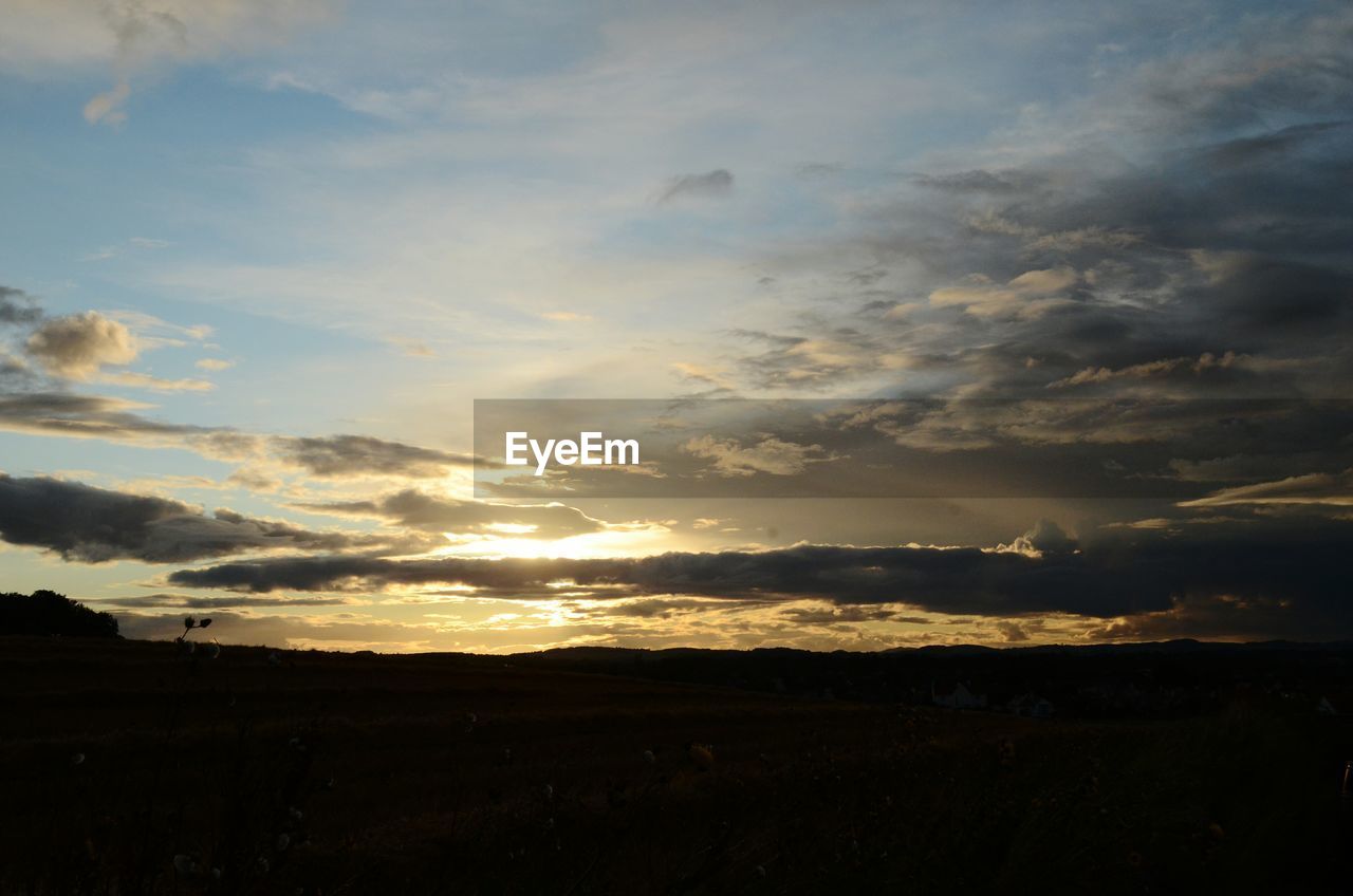 SILHOUETTE LANDSCAPE AT SUNSET