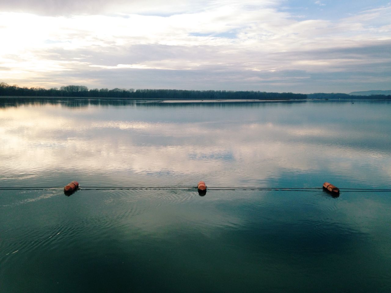 Buoys in still lake