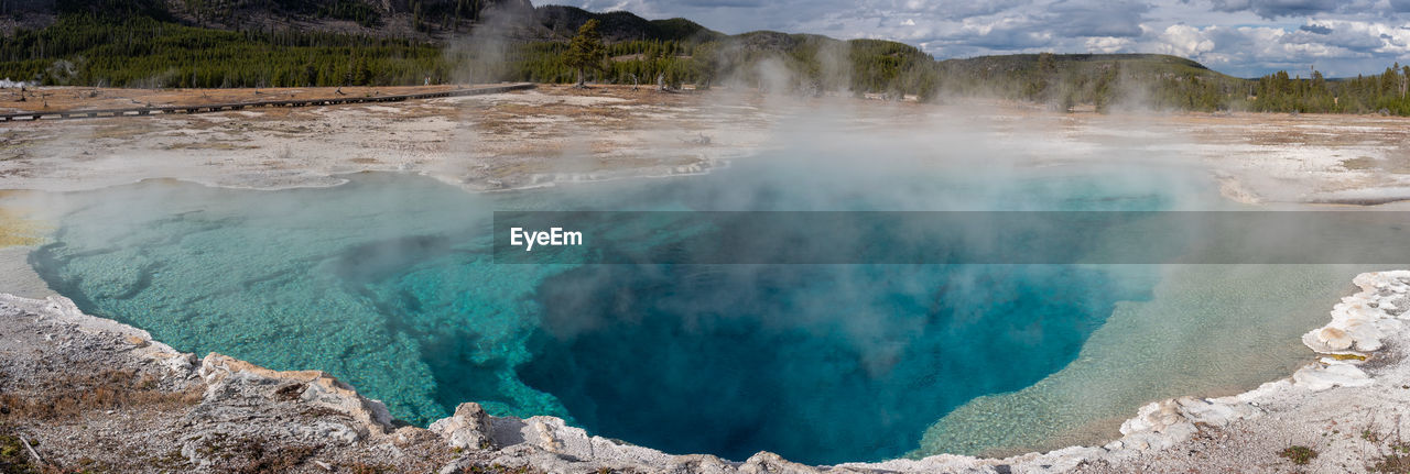 Brilliant blue thermal pool in yellowstone national park