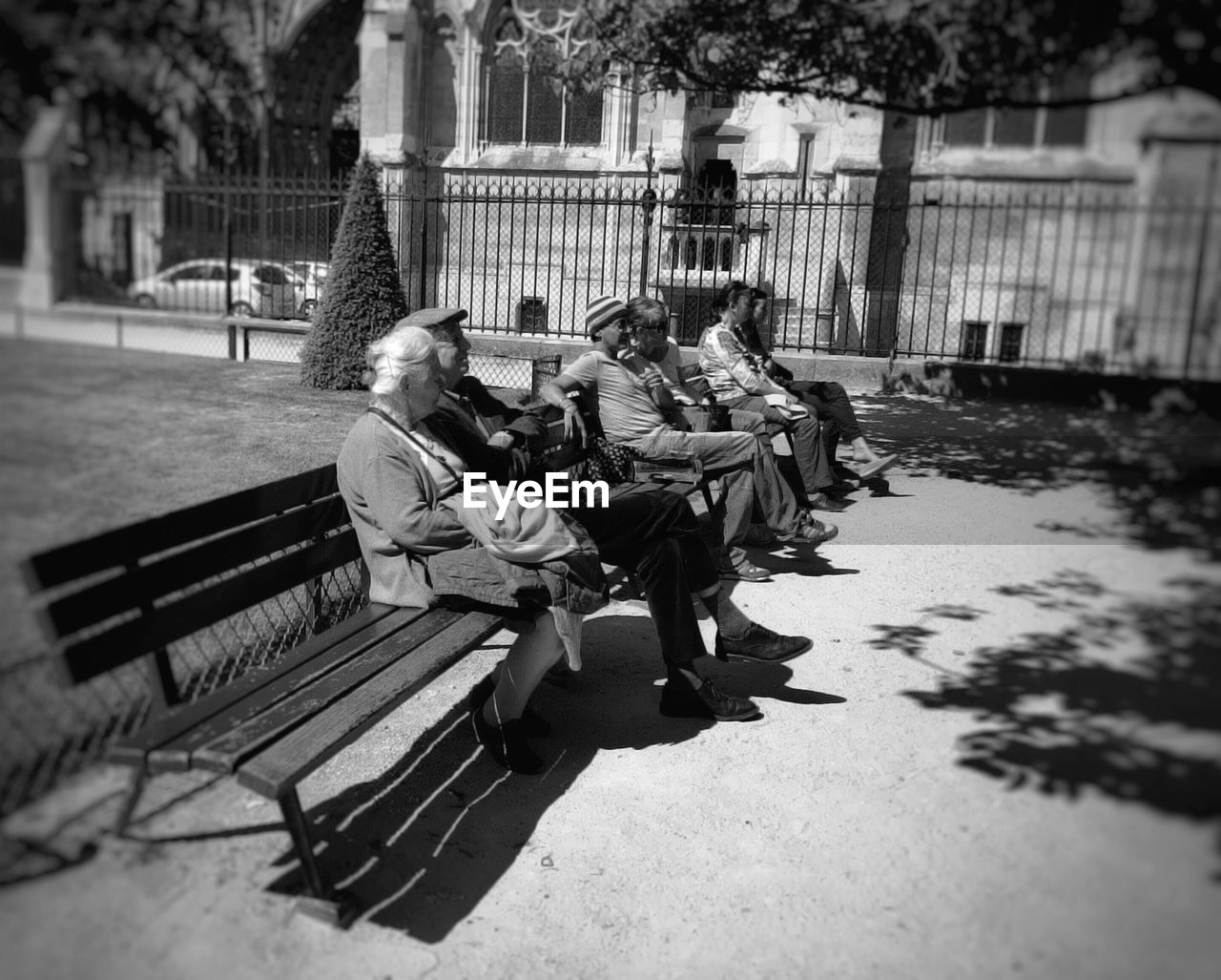 Senior people sitting on bench at park