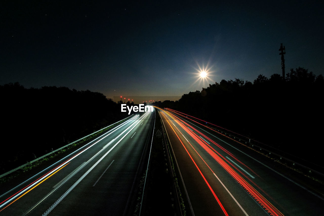 Light trails on highway at night