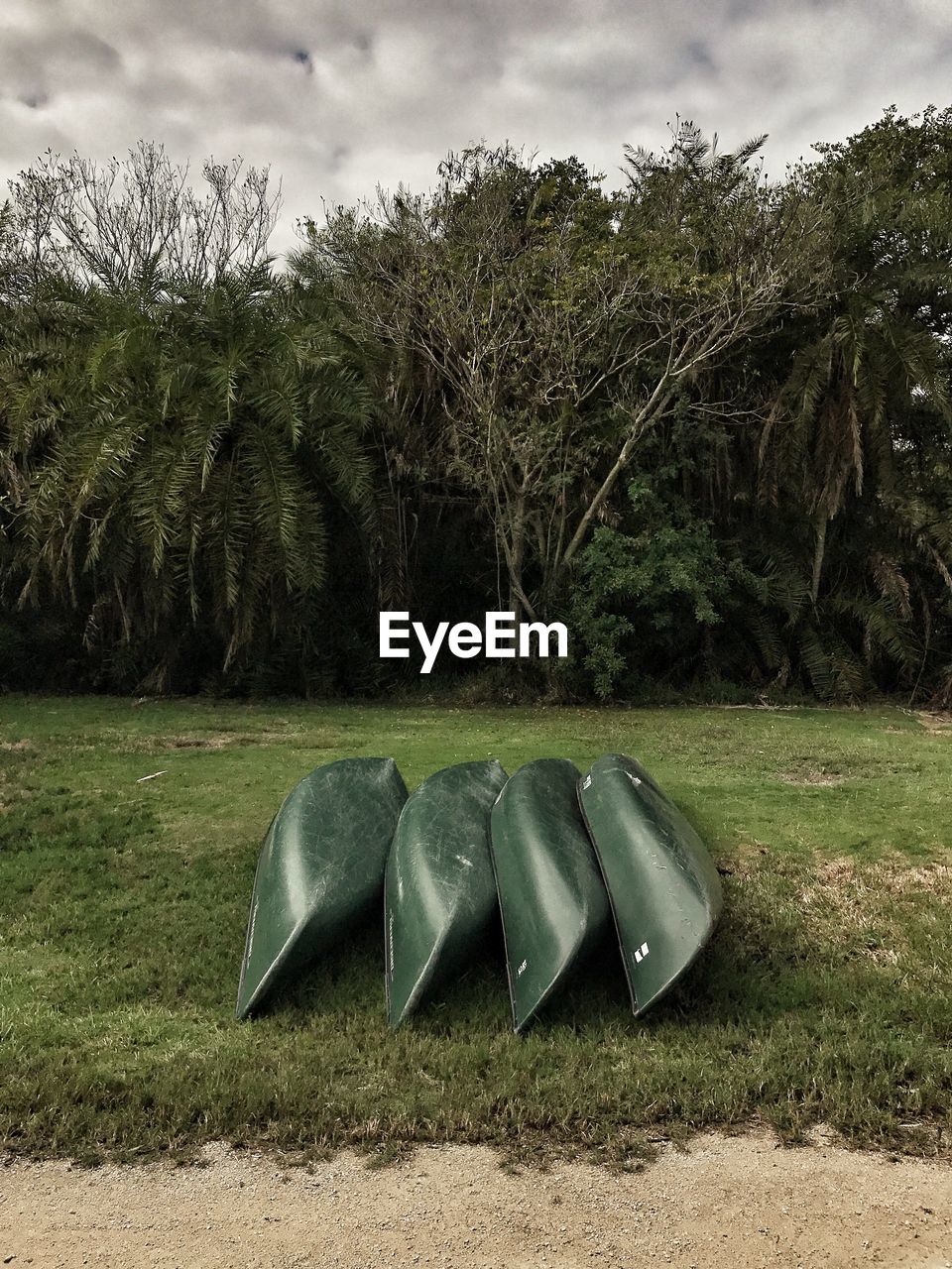 Upside down canoes on field