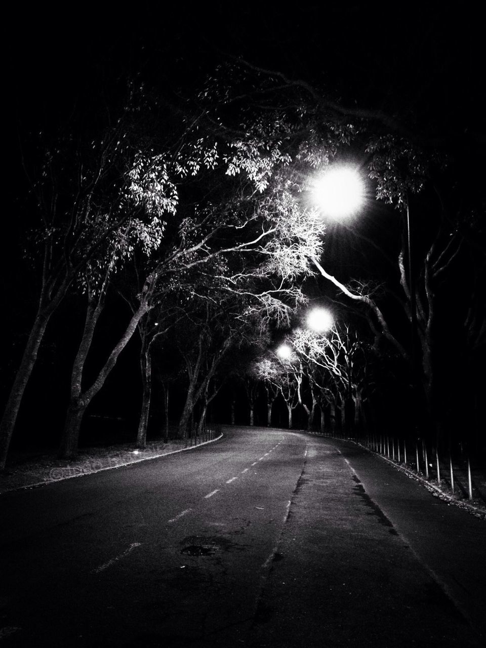 VIEW OF ROAD AT NIGHT