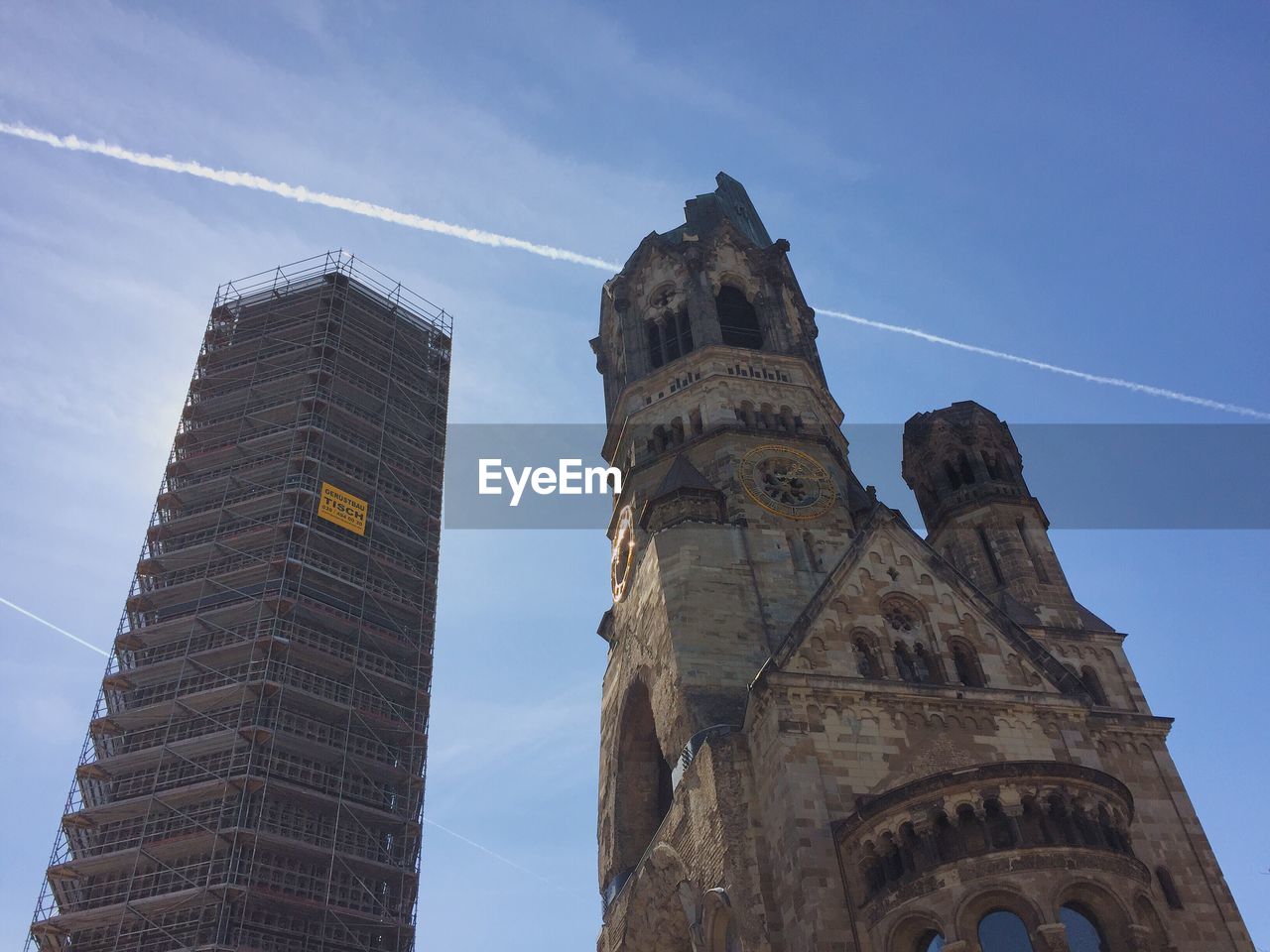 Low angle view of kaiser wilhelm memorial church against sky