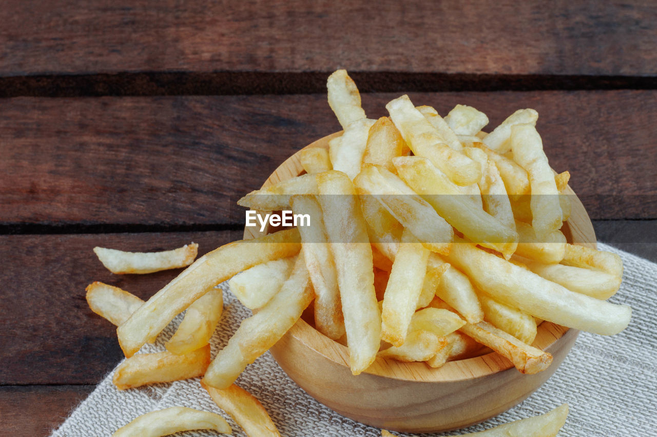 Close-up of french fries on table