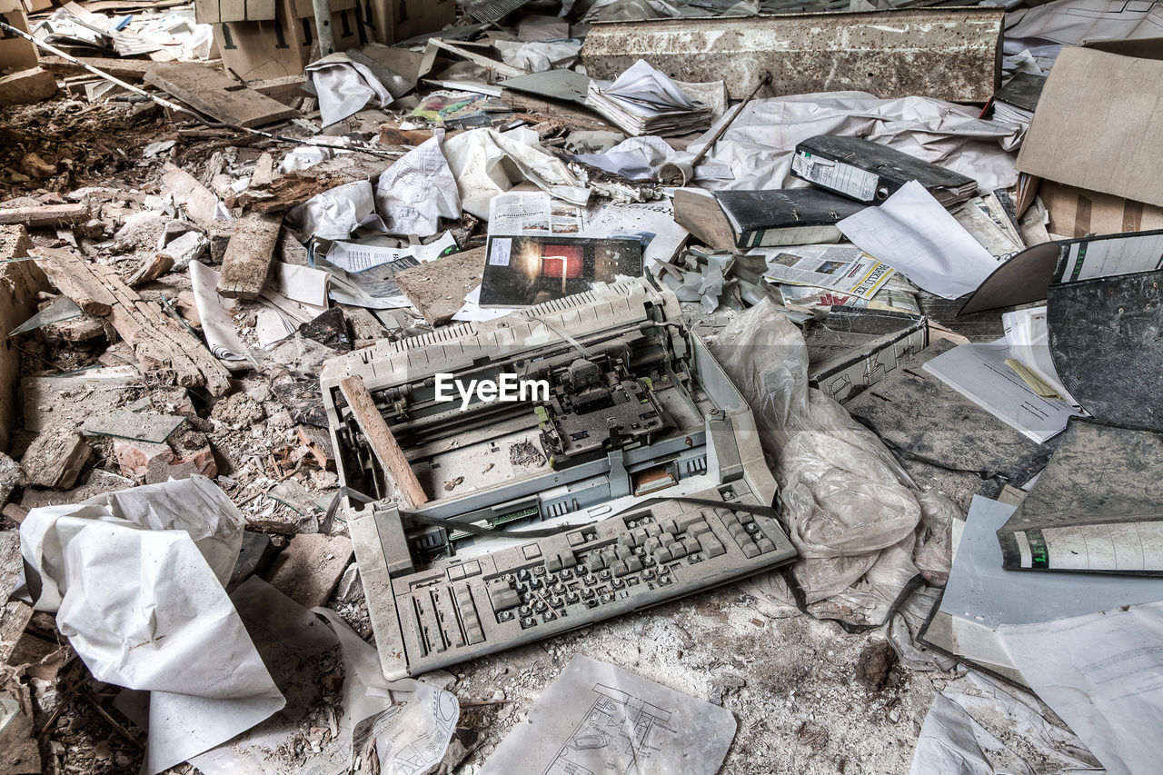 High angle view of abandoned typewriter