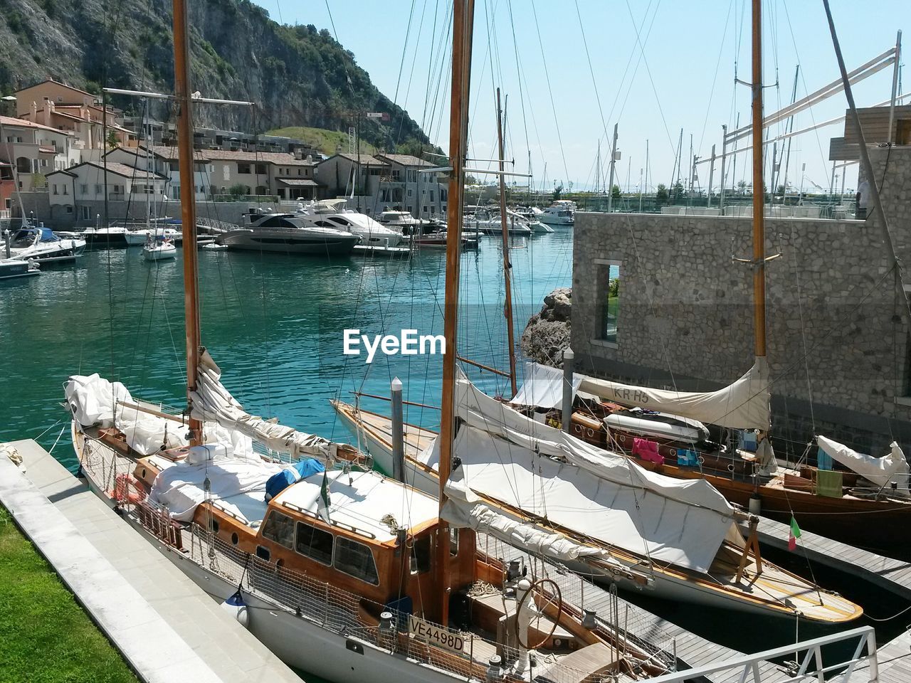 Boats moored at harbor