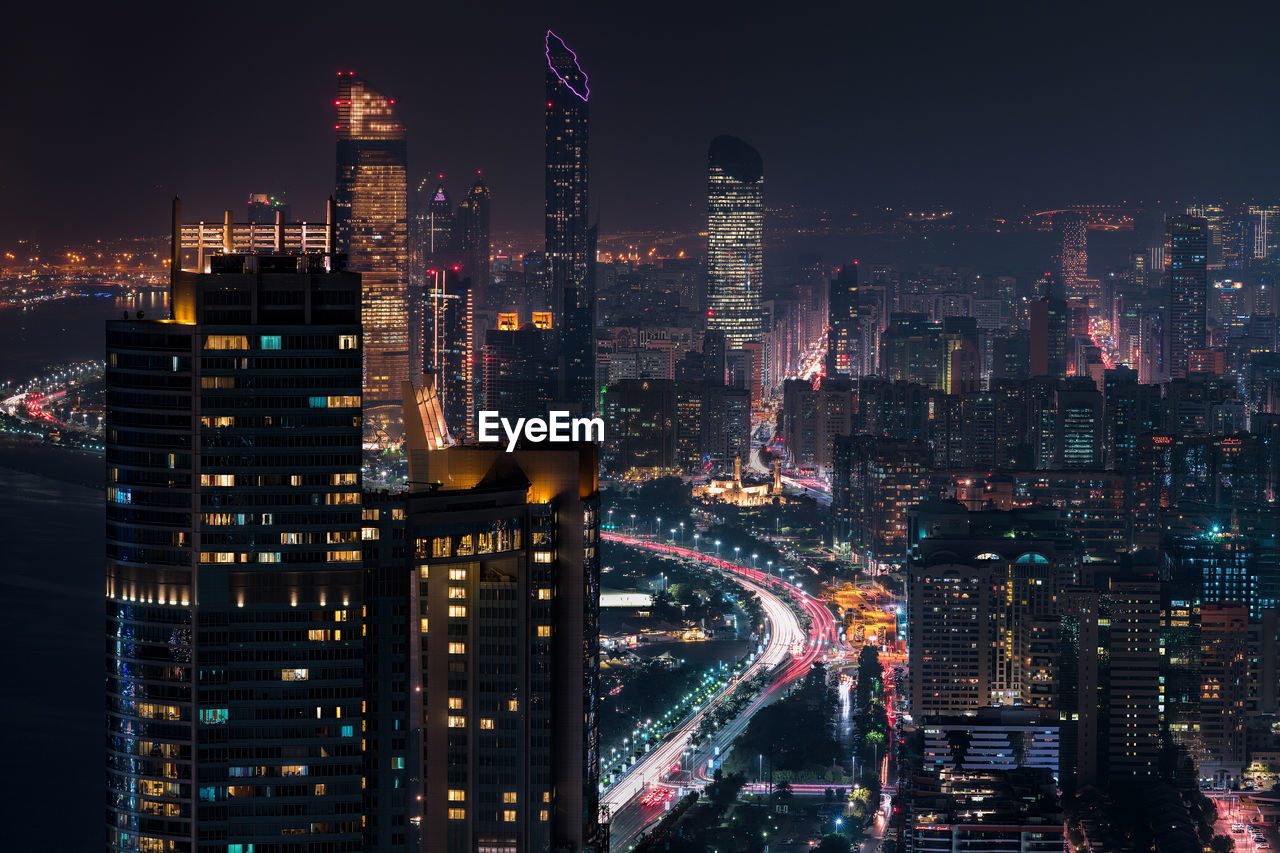 Aerial view of illuminated cityscape at night