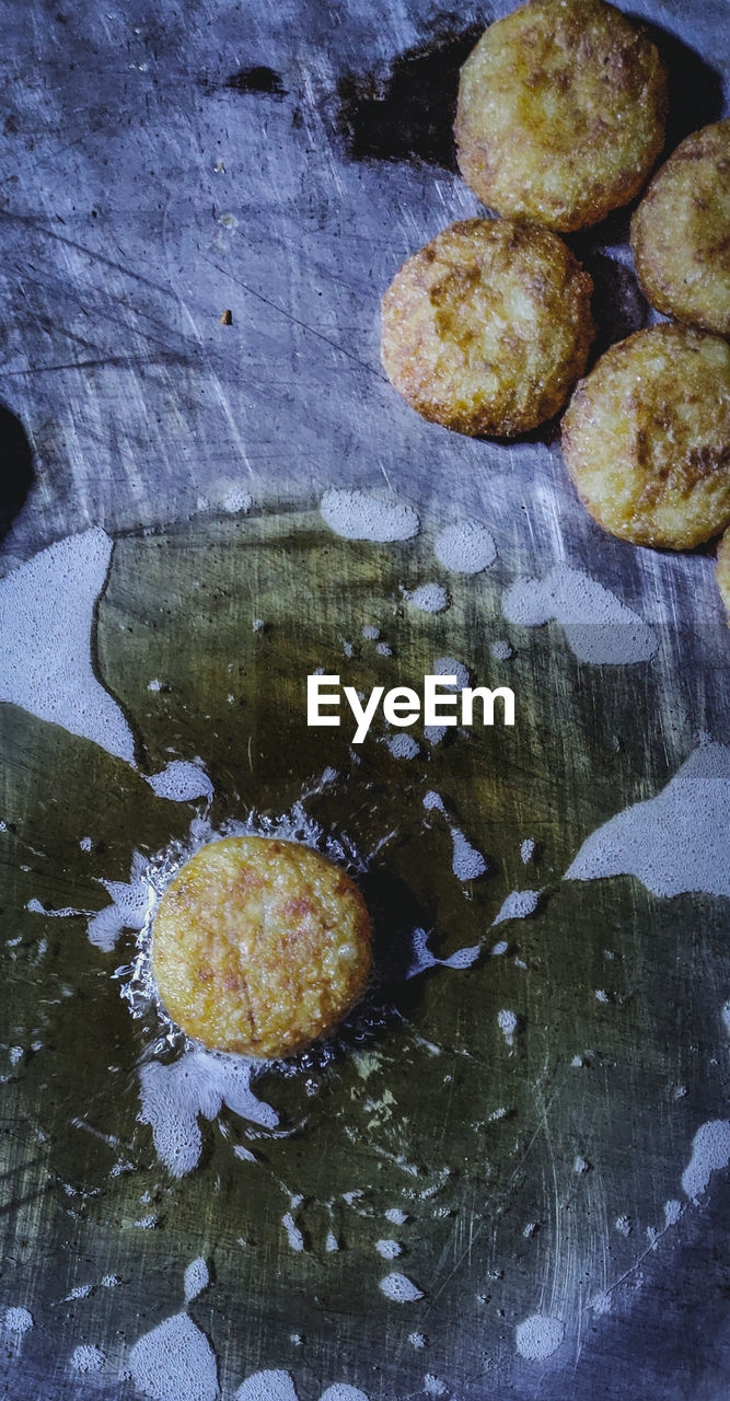 HIGH ANGLE VIEW OF DESSERT IN WATER