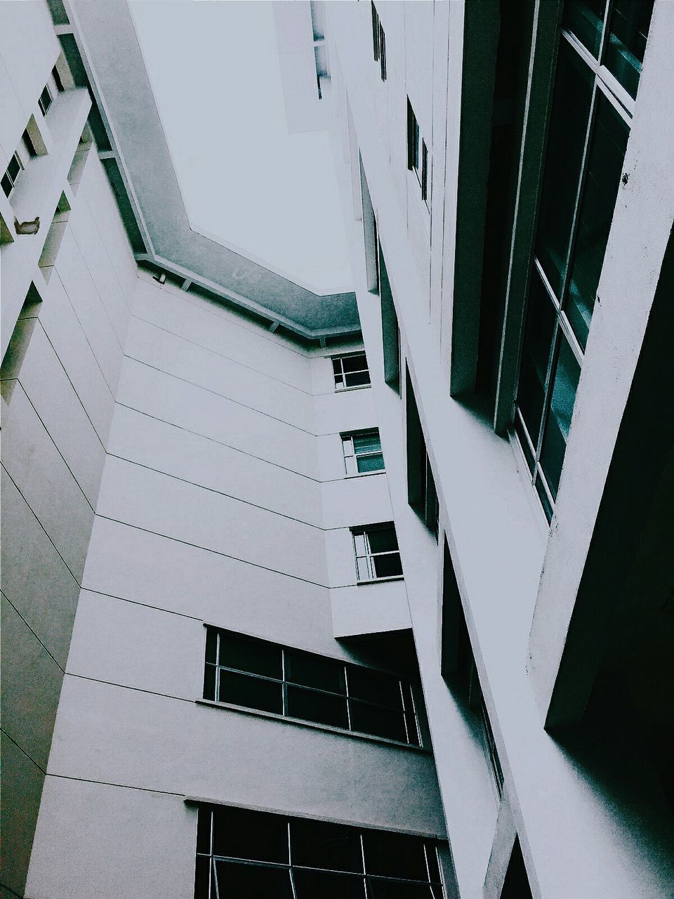 LOW ANGLE VIEW OF MODERN BUILDINGS