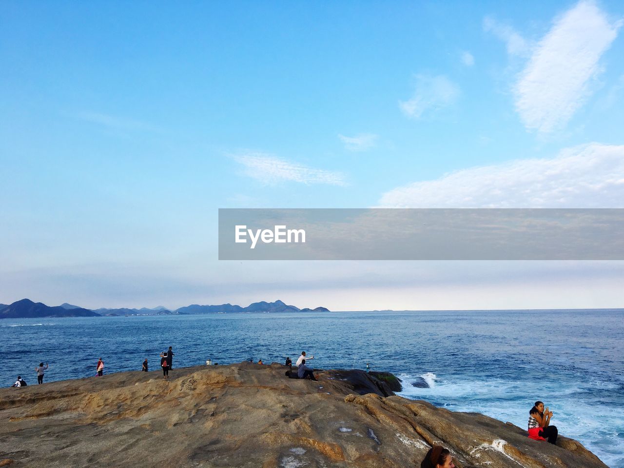 Group of people on calm beach