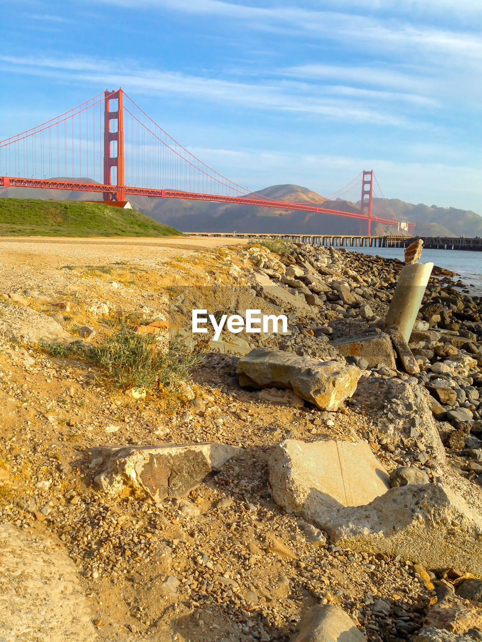 VIEW OF SUSPENSION BRIDGE OVER WATER