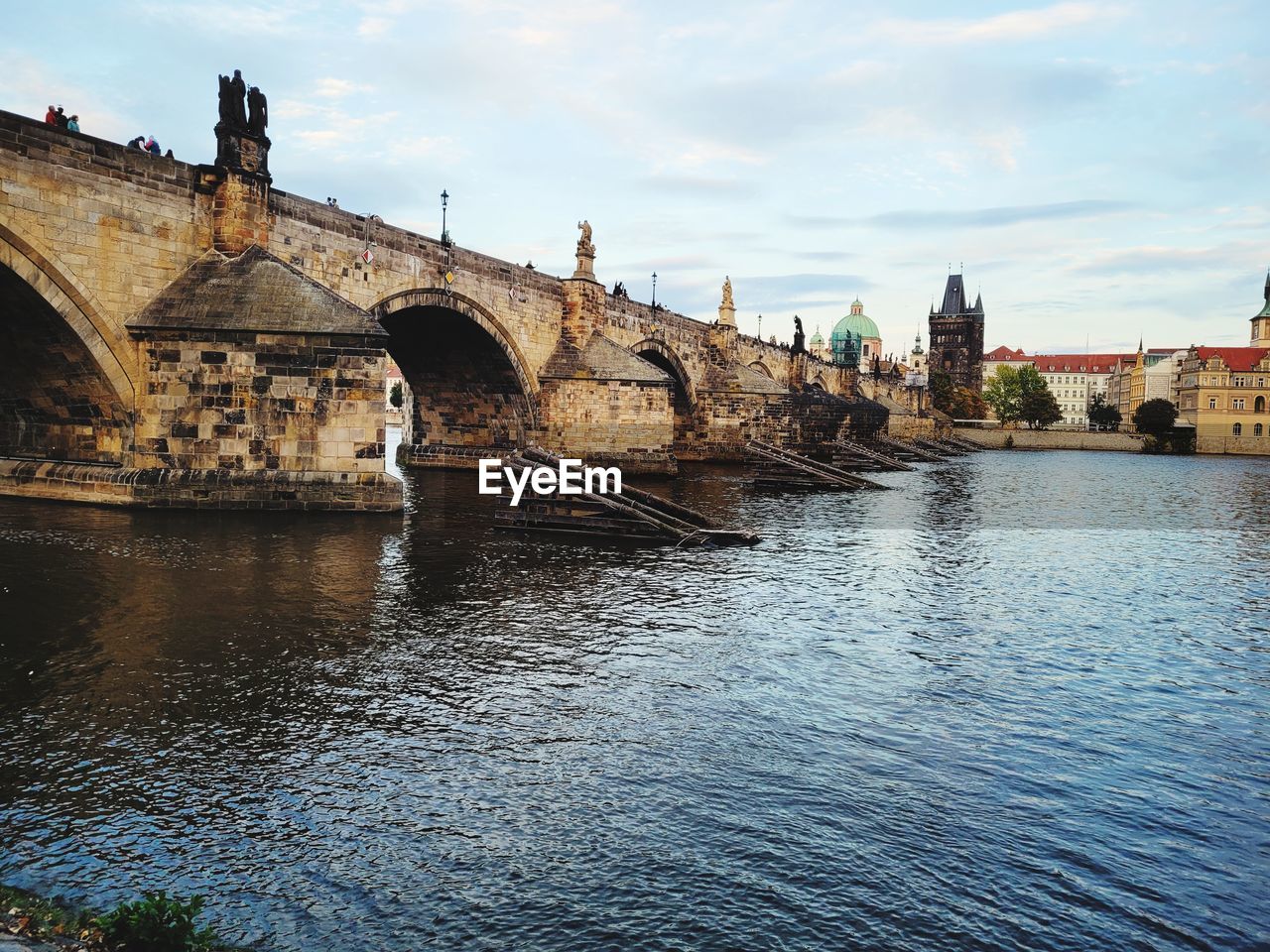 Bridge over river against sky