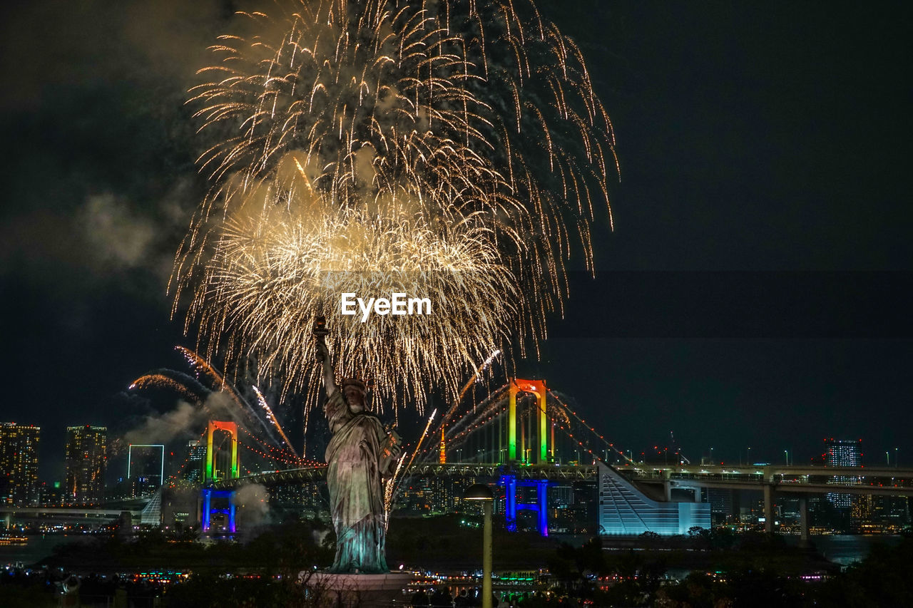 Firework display at night