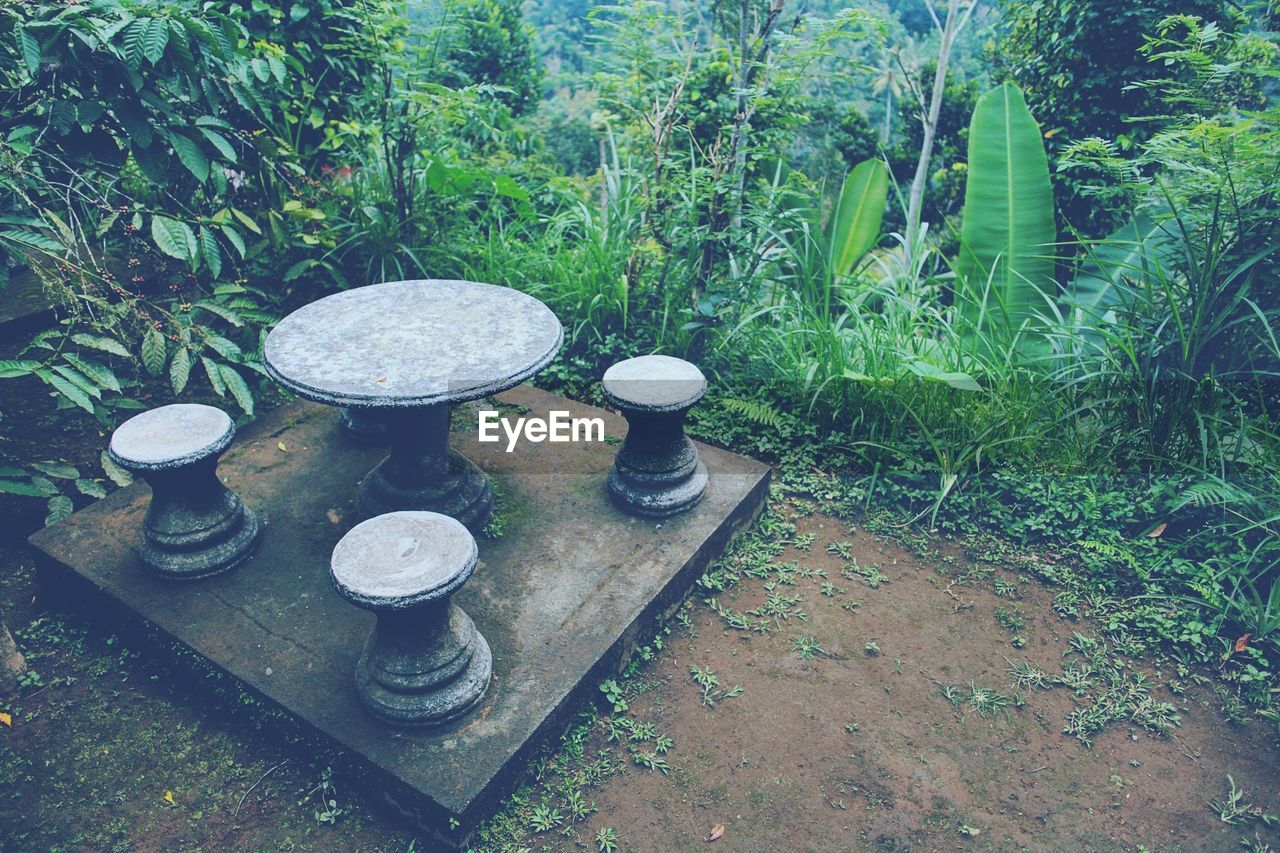 Close-up of stone furniture in garden