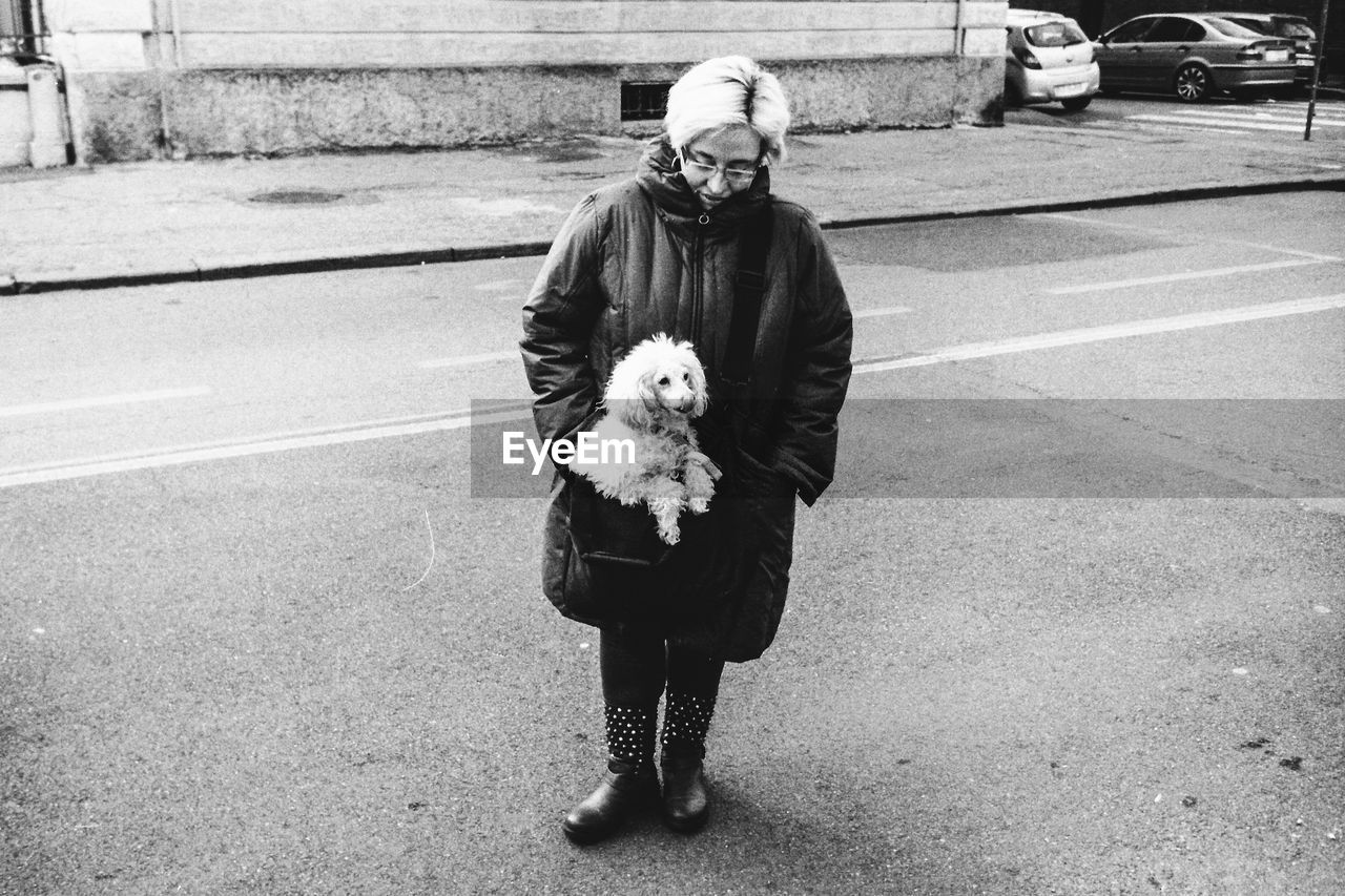 WOMAN WALKING ON STREET