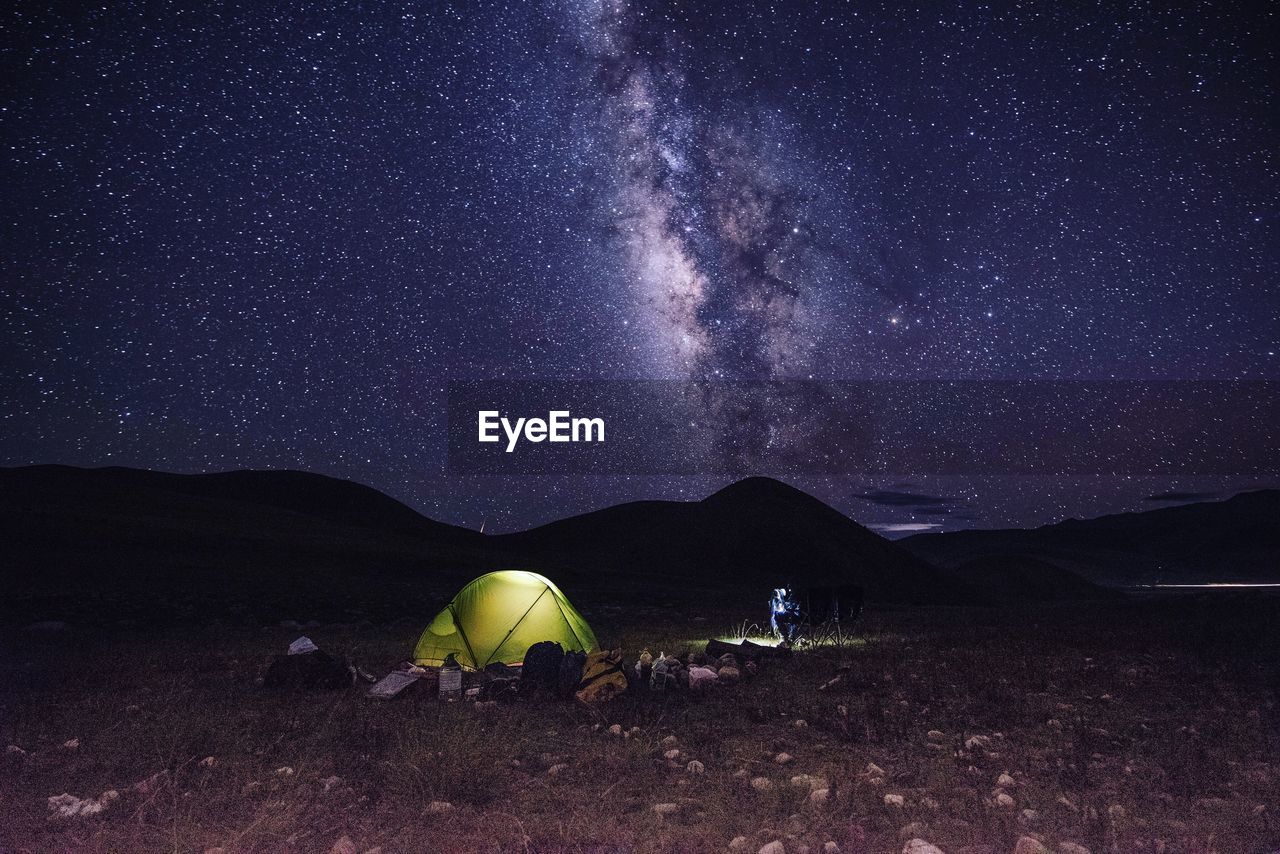 Tent against sky at night