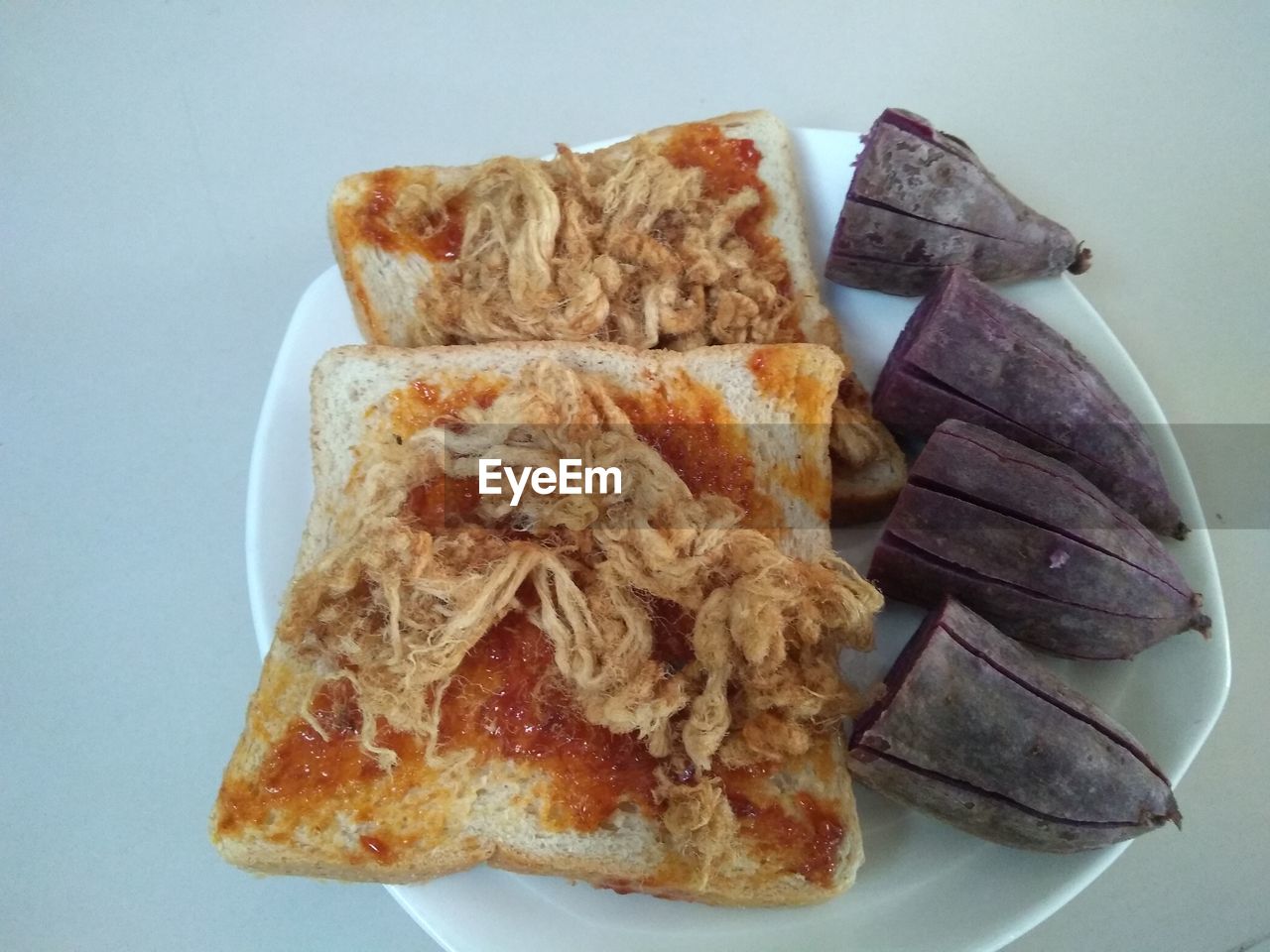 HIGH ANGLE VIEW OF BREAKFAST SERVED ON TABLE